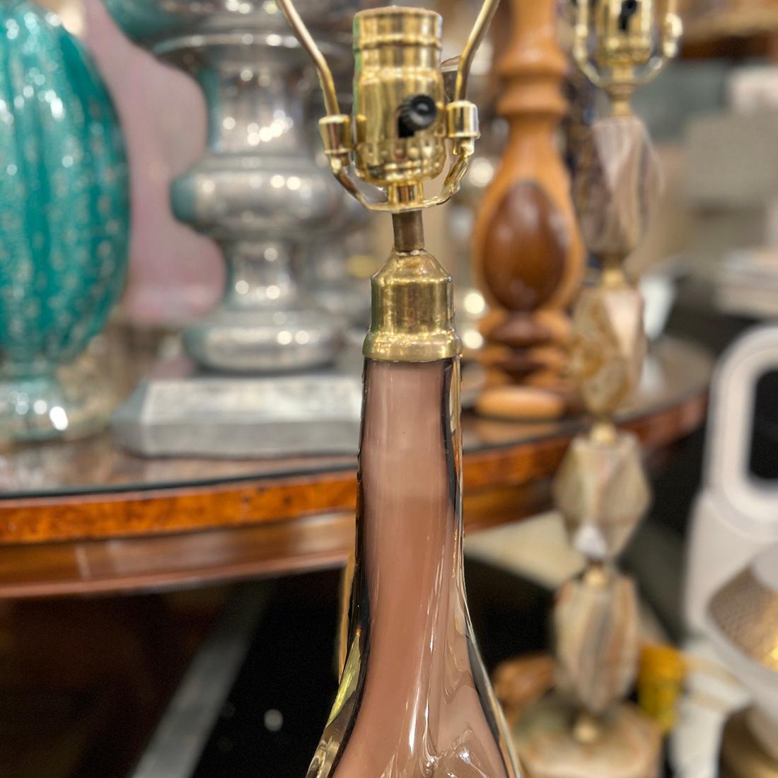 A Midcentury single Murano, amethyst to clear glass lamp. Very nice sculptural shaped body. 

Measurements:
Height of body only: 16