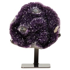 Sezione di ametista con occhio di stalattite tagliato e calcite
