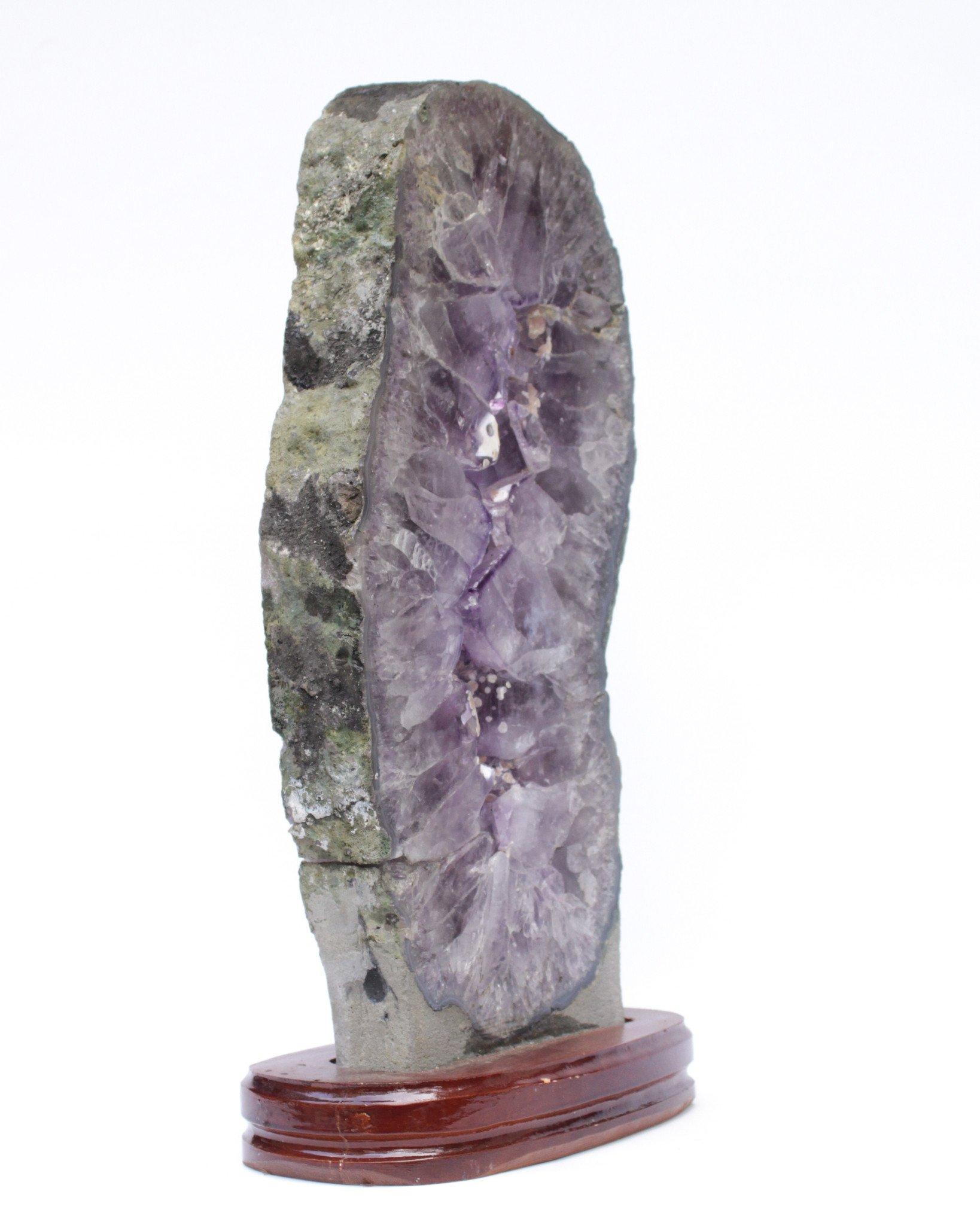 Organic Modern Amethyst Slice with Calcite Deposits and a Baroque Pearl on a Polished Wood Base For Sale