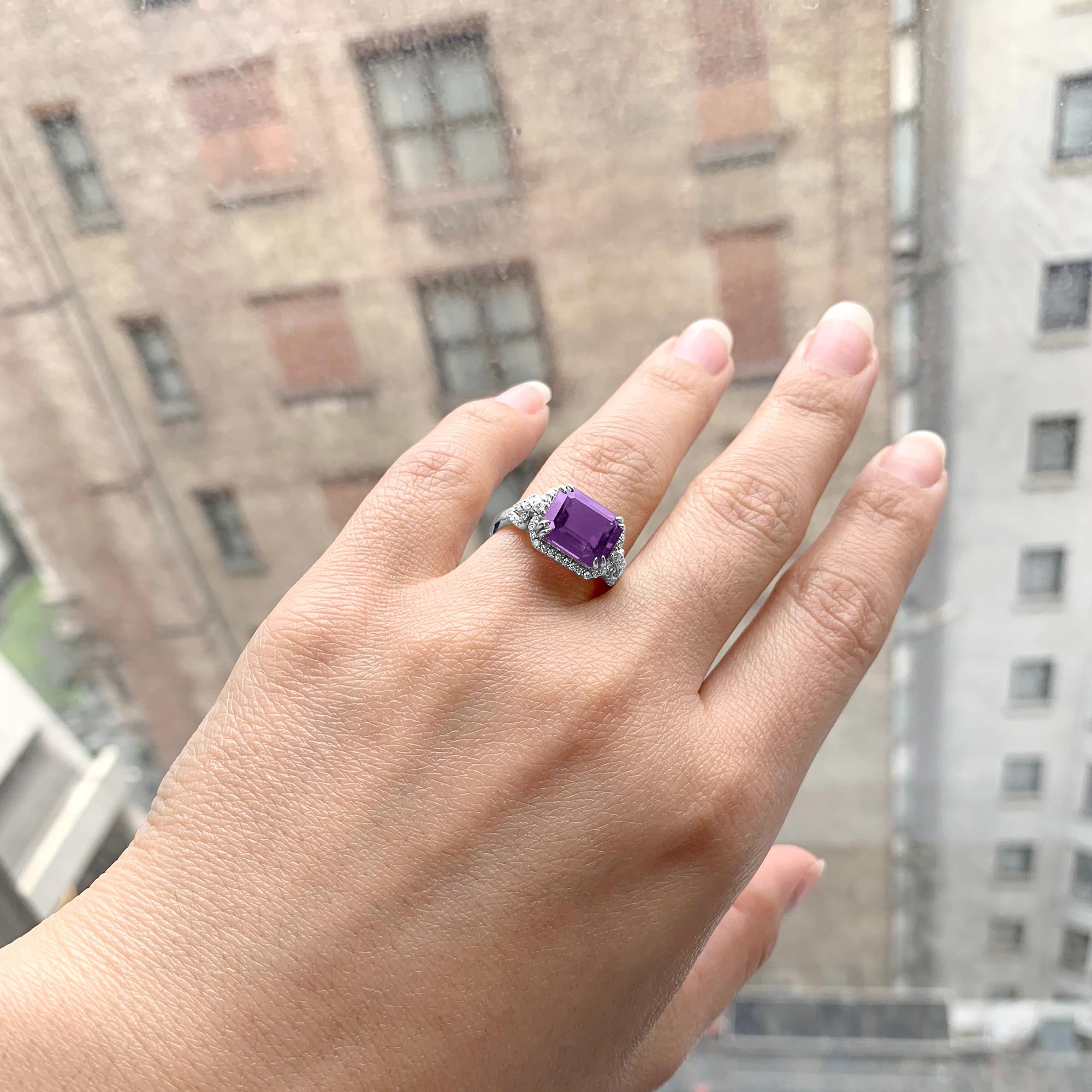 Amethyst Small East-West Emerald Cut Ring in 18K White Gold with Diamonds, from 'Gossip' Collection. Please allow 2-4 weeks for this item to be delivered.

Stone Size: 8 x 10 mm 

Diamonds: G-H / VS, Approx Wt: 0.34 Cts