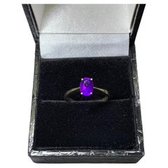 Amethyst solitaire engagement ring yellow gold