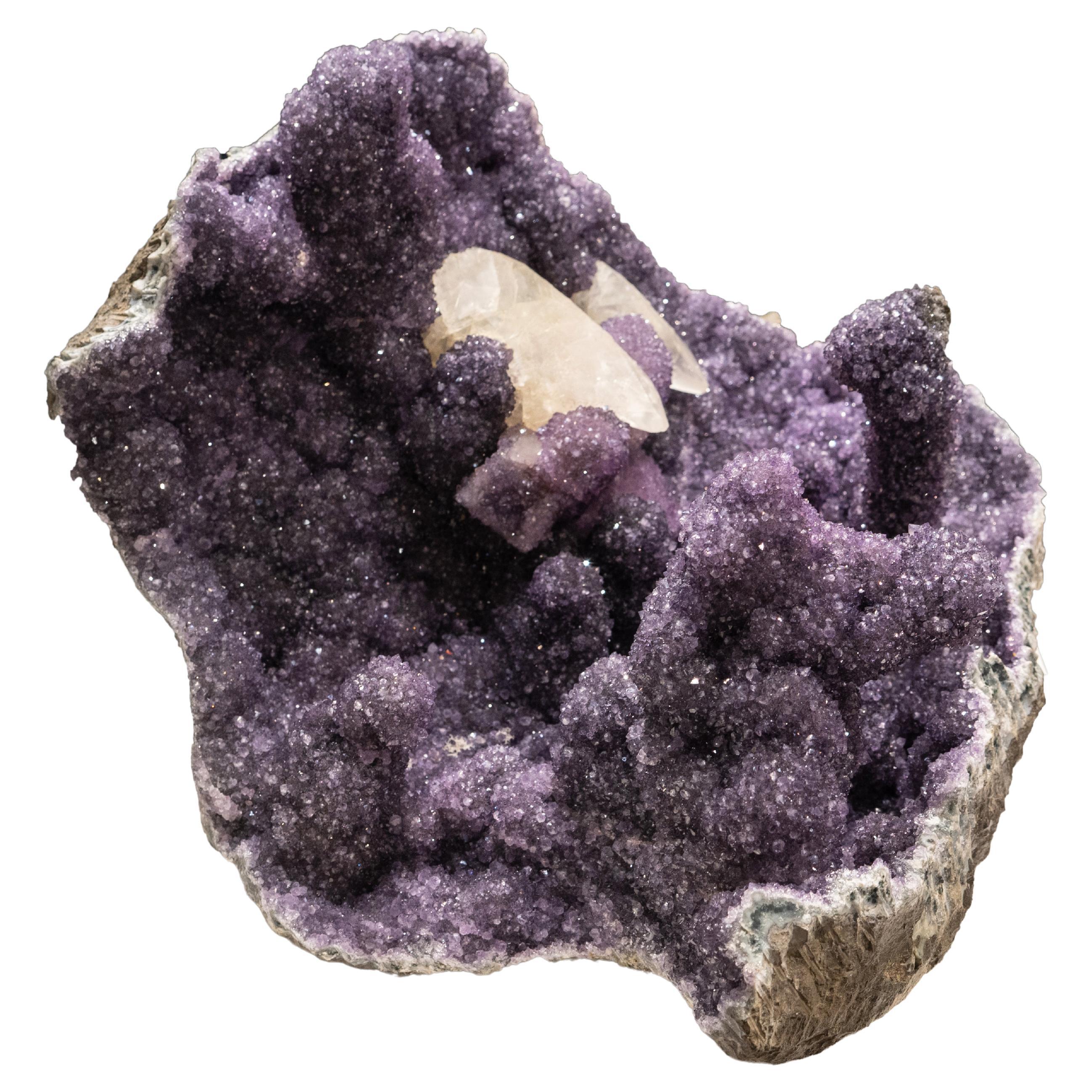 This specimen from San Eugenio, Artigas Dept., Uruguay is a large museum quality cluster of several stalactitic formations of scintillating gem amethyst crystals with 2 isolated golden calcite crystals in sharp scalenohedral from with gem