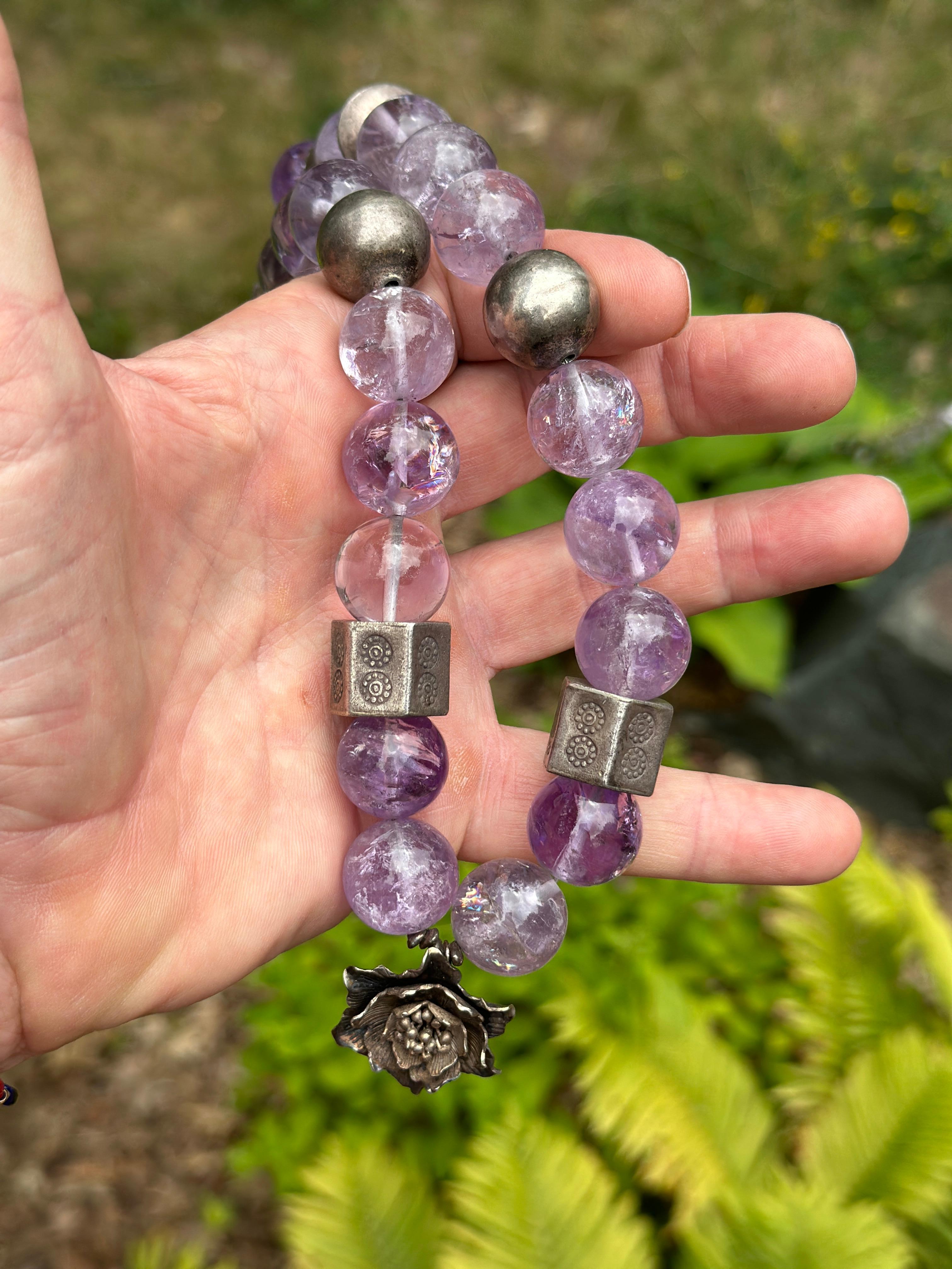 This is a fabulous 21 inch 18mm Amethyst Bead Necklace with engraved Sterling Silver beads and clasp.  The monumental amethyst necklace is a masterwork of Mid-Century design.  The magnificent 3/4 inch (18mm) large natural Amethyst beads are some of