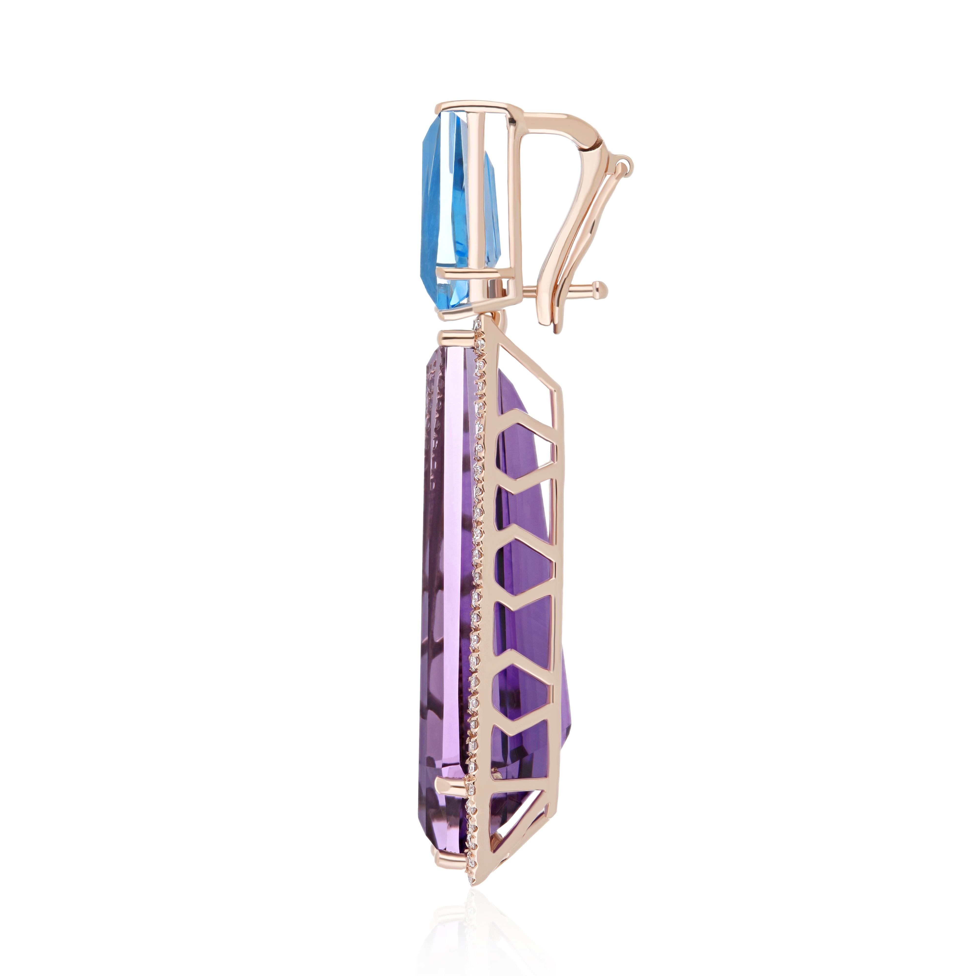 Elegant and exquisitely detailed Cocktail 14K Pendant, center set with 10.40Cts. (approx) Elongated Fancy Cut Amethyst , Swiss Blue Topaz With 2.02Cts(approx) In Fancy Shape . Its Also set in Prong setting. Surrounded with Diamonds, weighing approx.