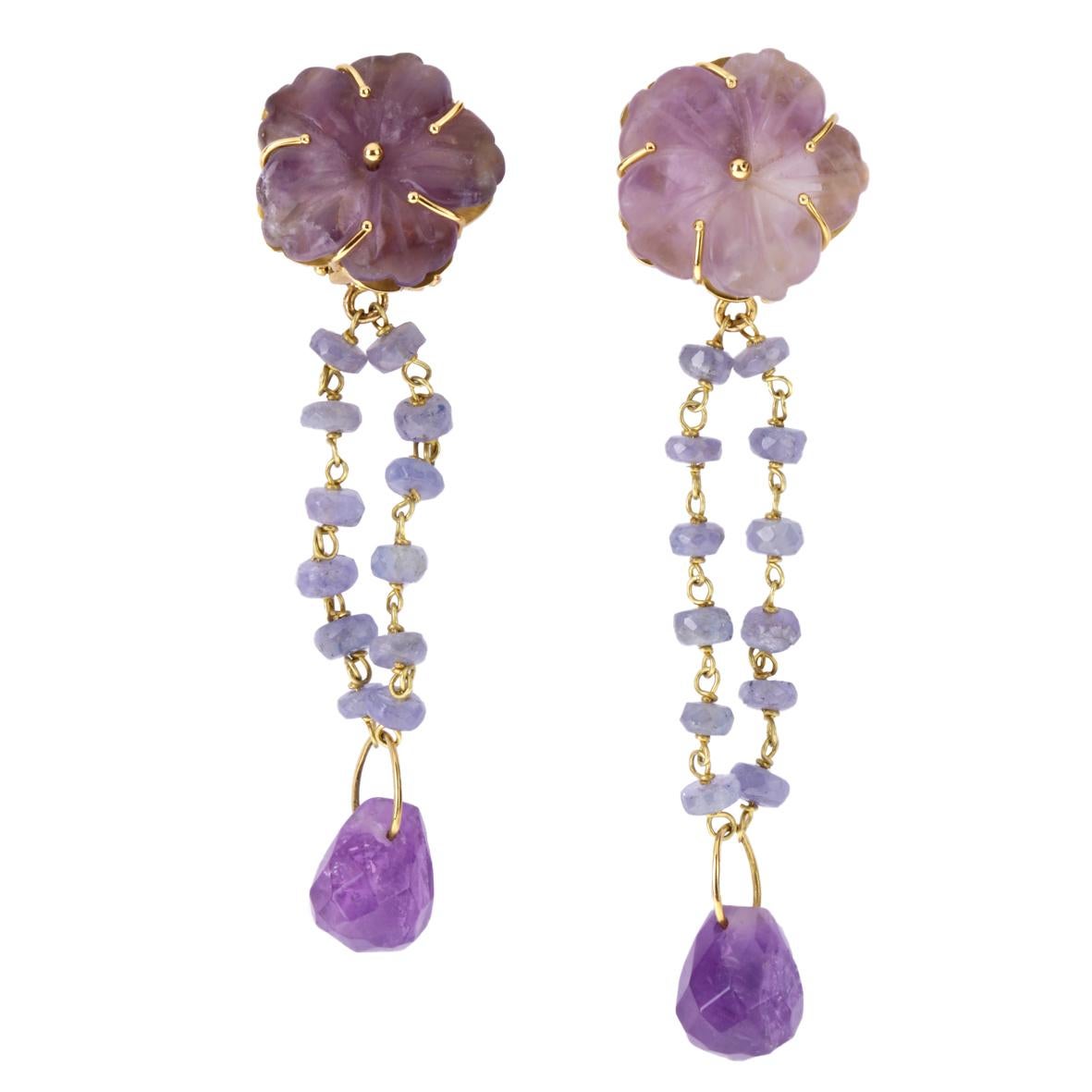 Earrings with carved amethyst flowers tanzanite and amethyst broil drops, gold 7,80gr, total length 6,5 cm, weight 7,4 gr.
All Giulia Colussi jewelry is new and has never been previously owned or worn. Each item will arrive at your door beautifully