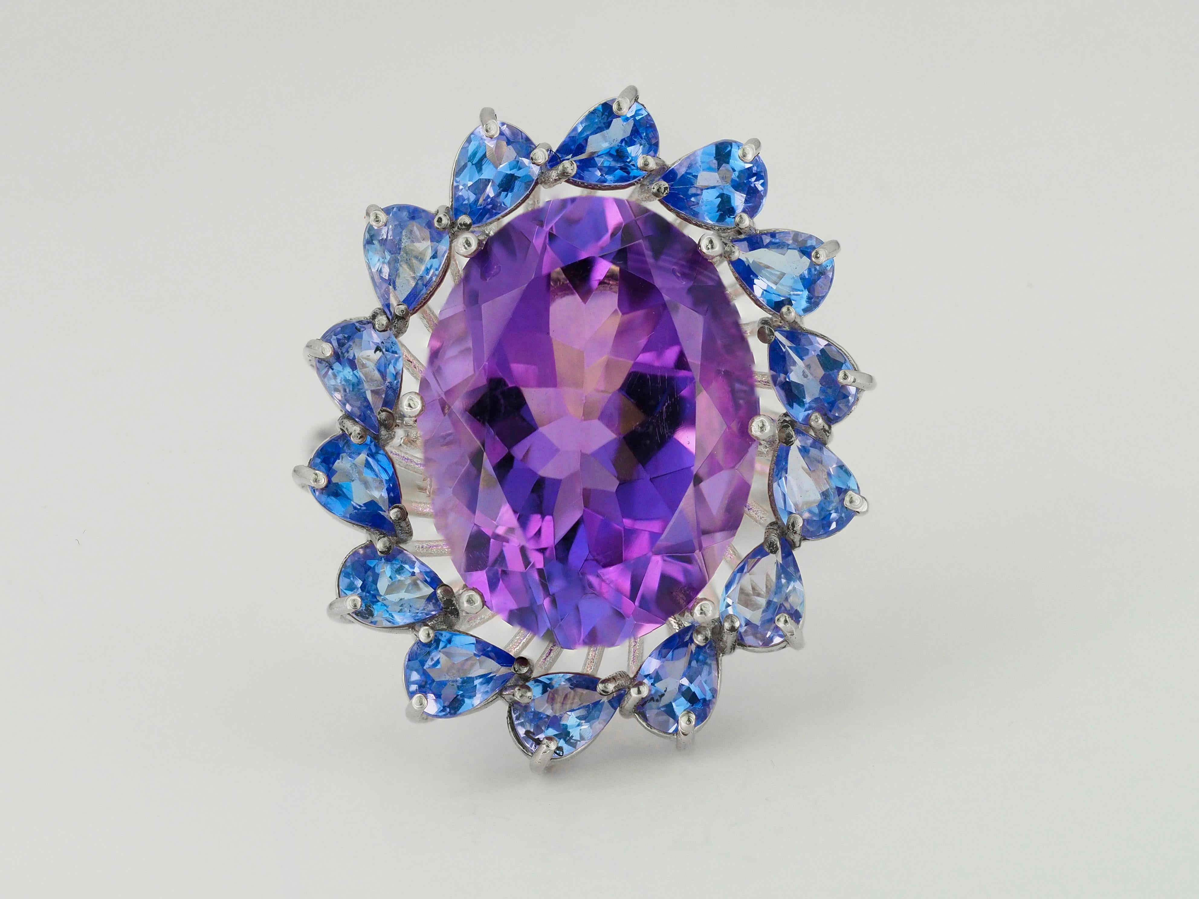 14 kt solid massive flower ring with natural amethyst, tanzanites and diamonds. February birthstone. December birthstone ring. Amethyst, tanzanites 14k gold ring. Oval amethyst ring. 

Weight approx. 9 g. depends from size

Central gemstone: Natural