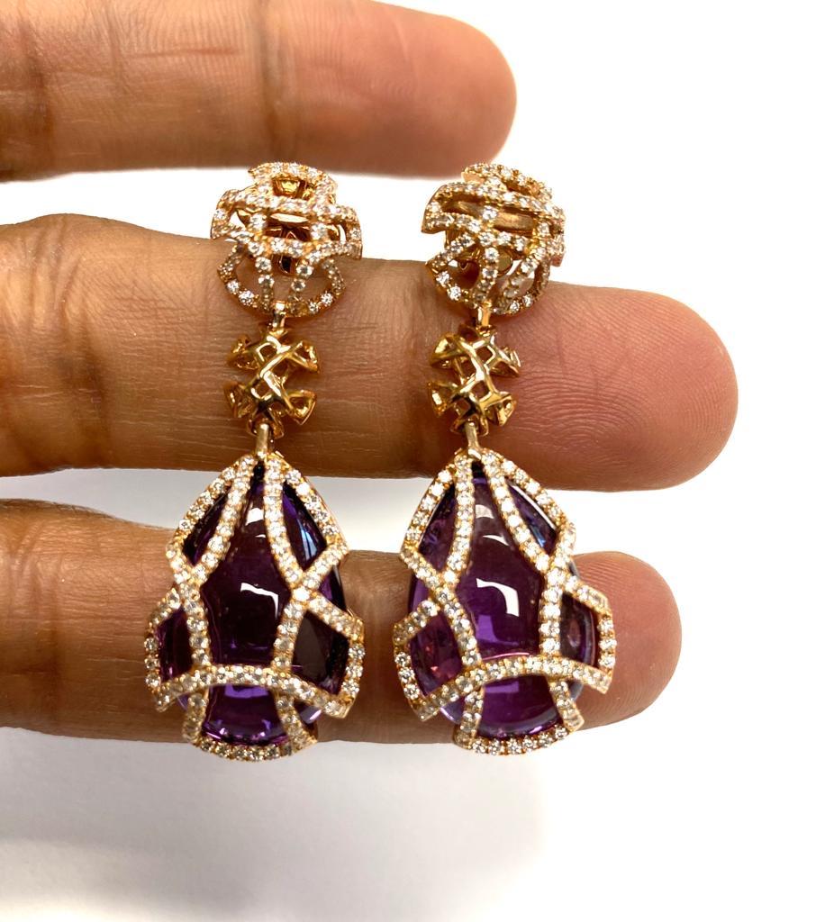 Amethyst Teardrop Earrings with Diamonds in 18K Yellow Gold, from 'Freedom' Collection

Stone Size: 19 X 12.7 mm

Gemstone Weight: 28.76 Carats

Diamond: G-H / VS, Approx Wt: 1.44 Carats
