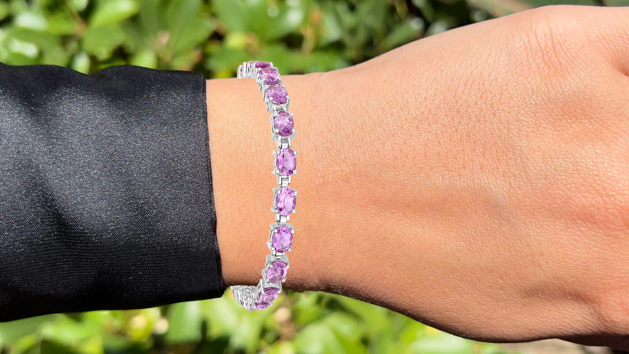 It comes with the Gemological Appraisal by GIA GG/AJP
All gemstones are natural
18 Amethysts = 14.30 Carats
Metal: Rhodium Plated Sterling Silver
Length: 7 Inches
*It can be shortened upon request