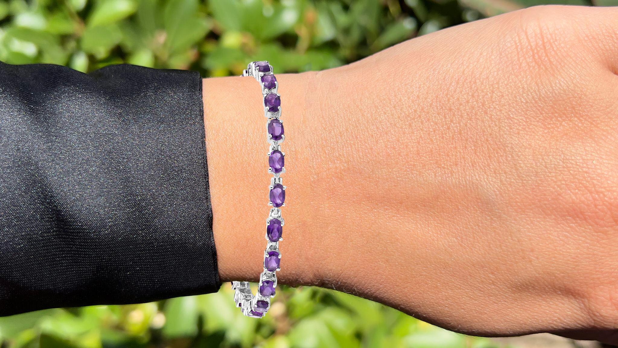 It comes with the appraisal by GIA GG/AJP
All Gemstones are Natural
21 Oval Amethysts = 7.98 Carats
Metal: Rhodium Plated Sterling Silver
Length: 7.25 Inches
