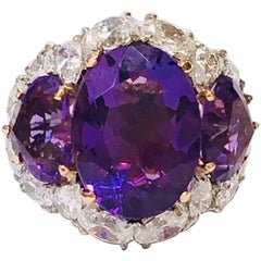 Amethyst Three-Stone Ring with Diamond Halo