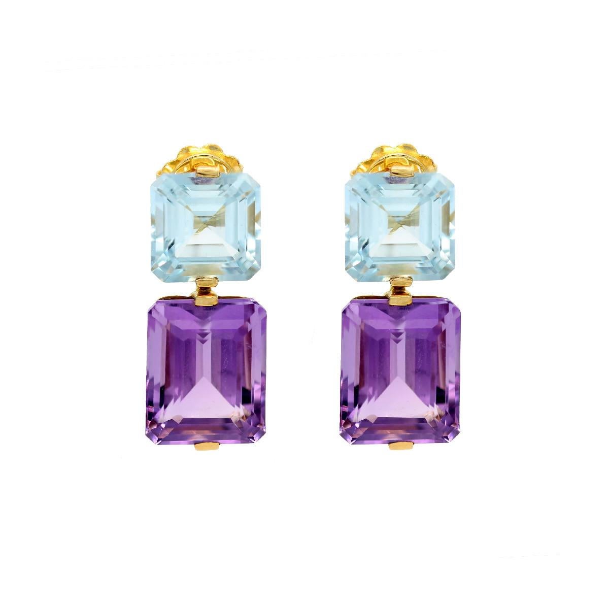  Amethyst,  Topaz  & 18K Yellow Gold Earrings
MATERIALS
◘ Earrings Weight:  7,82 grams
◘ 2 Amethyst  35,61 ct. 
◘ 2 Topaz 22,22 ct


Irama Pradera is a dynamic and outgoing designer from Spain that searches always for the best gems and combines