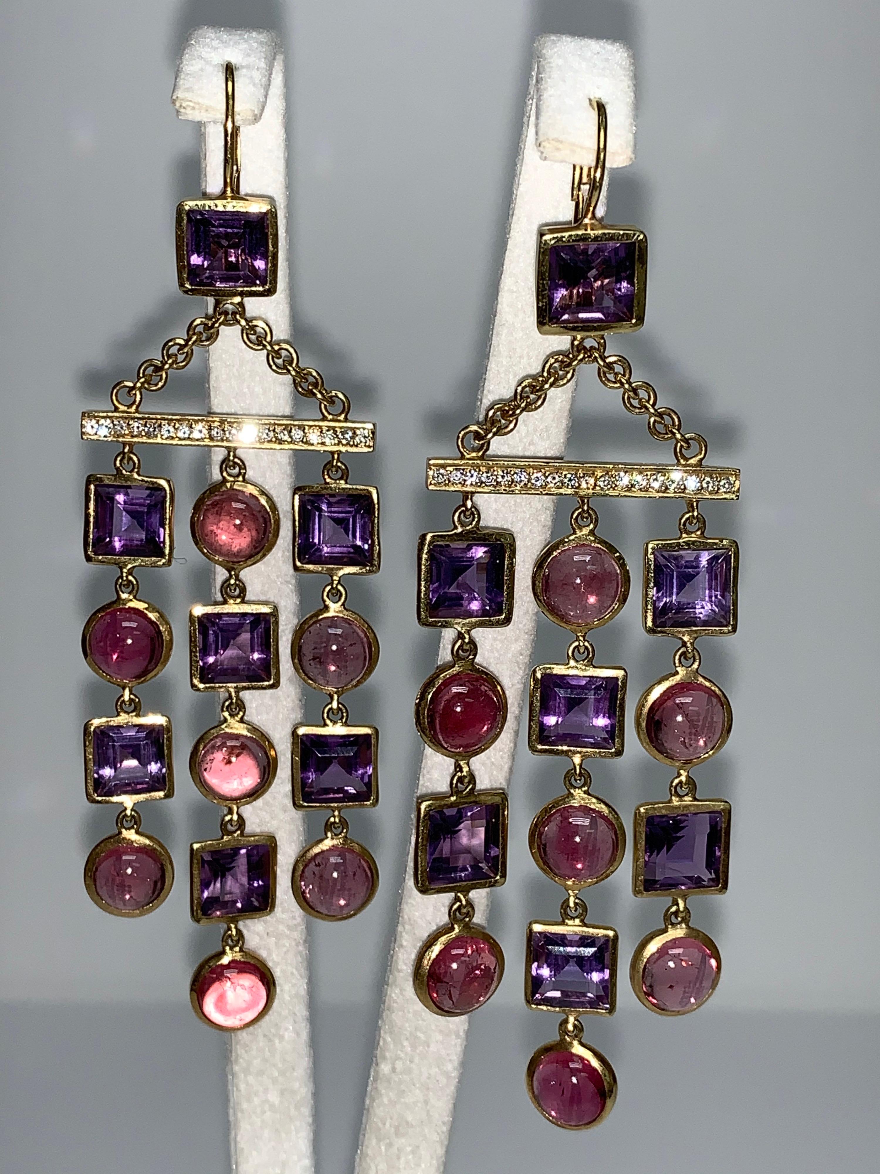 Amethyst & Pink Tourmaline, Yellow Gold Chandelier Earrings, Art Deco style. 

Featuring an exquisite pair of Amethyst & Pink Tourmaline Stones with a total weight of 44.24 carats; accented White Pavé Diamonds with a total weight of 0.35 carats, set