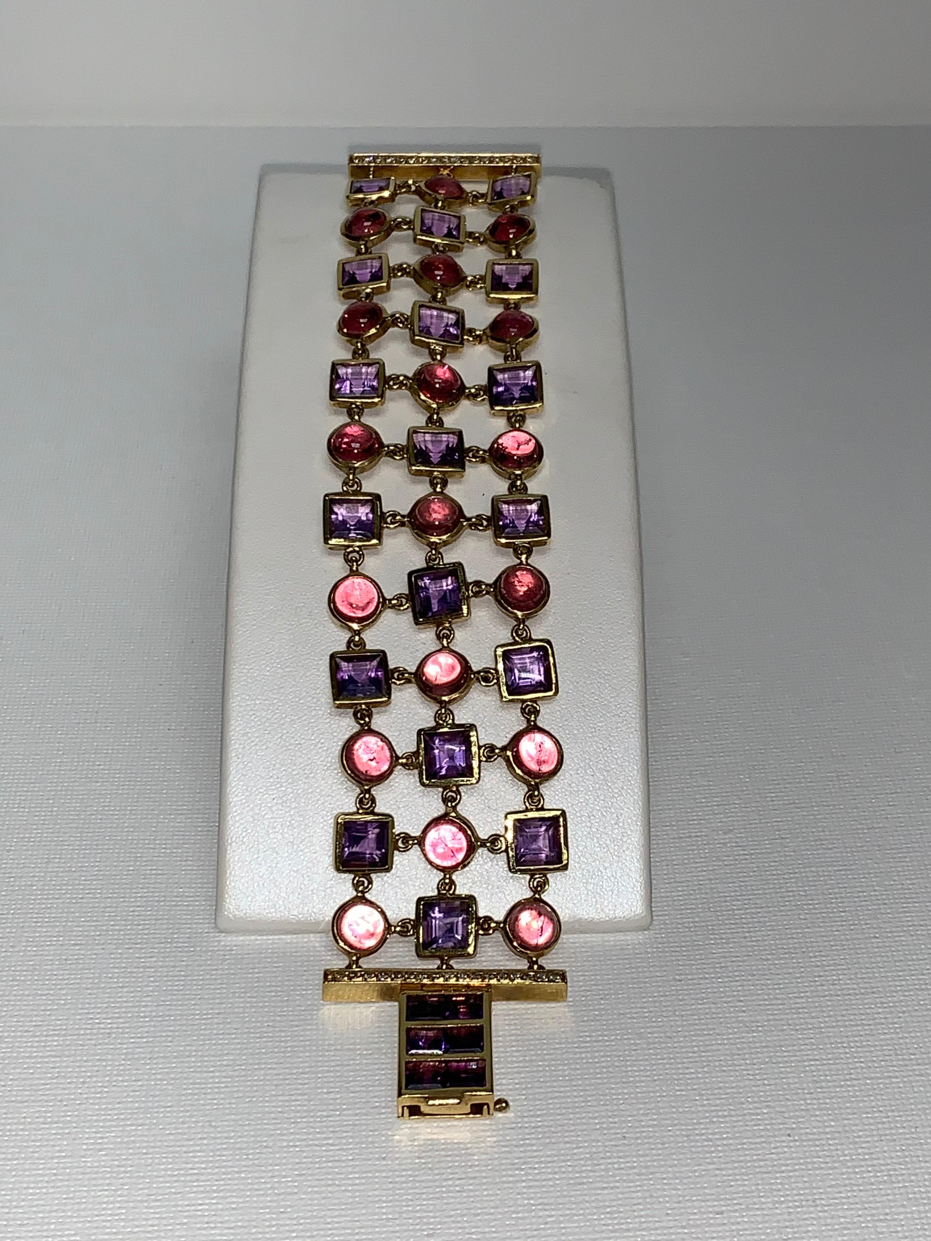 Amethyst & Pink Tourmaline, Pavé Diamond Bracelet, Art Deco. 

Featuring an exquisite Amethyst & Pink Tourmaline Bracelet with 56.98 carats; accented White Pavé Diamonds with a total weight of 0.63 carats, set in 18K Yellow Gold. 

This
