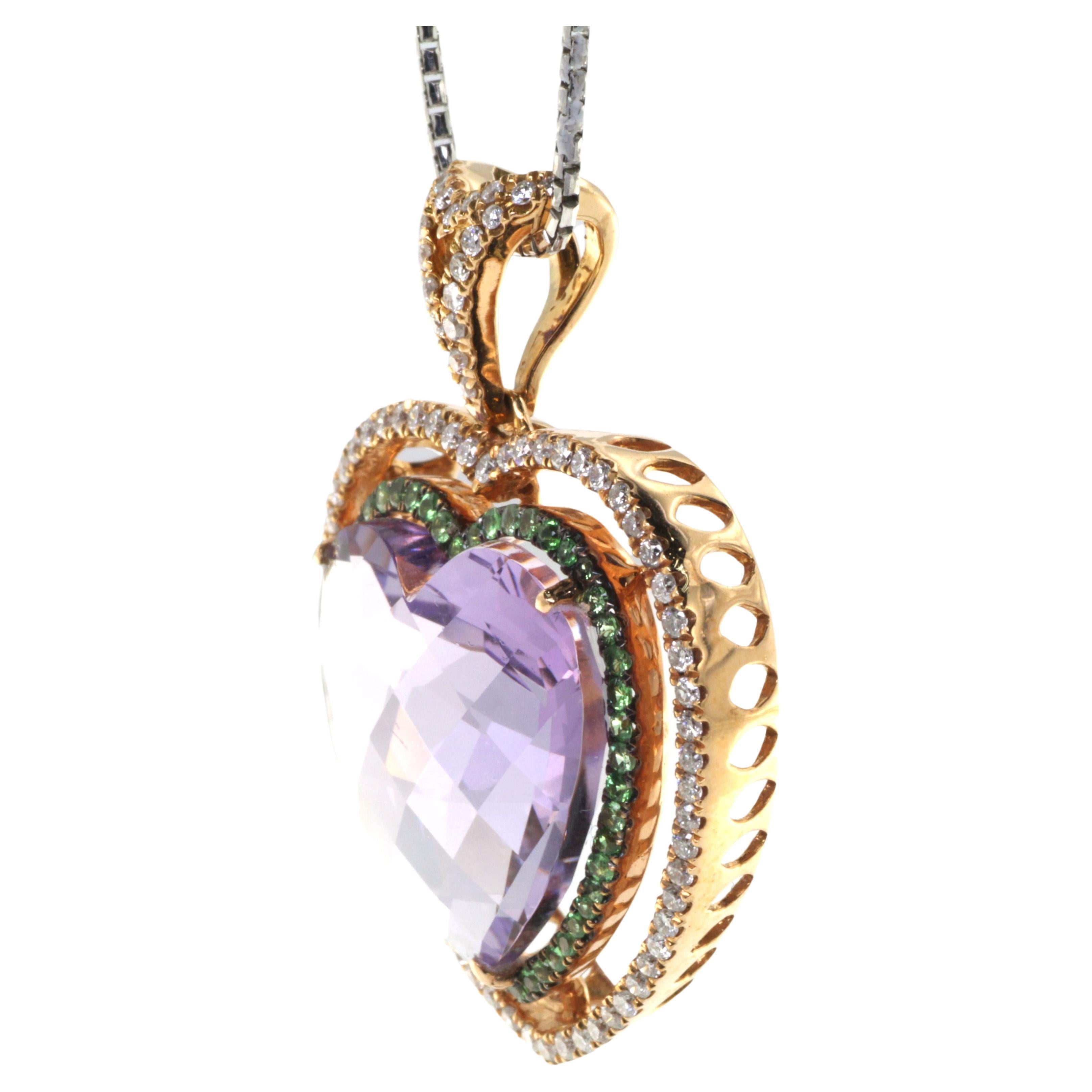 Presenting our stunning Amethyst, Tsavorite, and Diamond Pendant, a vibrant and elegant piece of jewelry that blends exquisite craftsmanship with beautiful gemstones. This pendant is a fine blend of colorful allure and shining luxury that promises