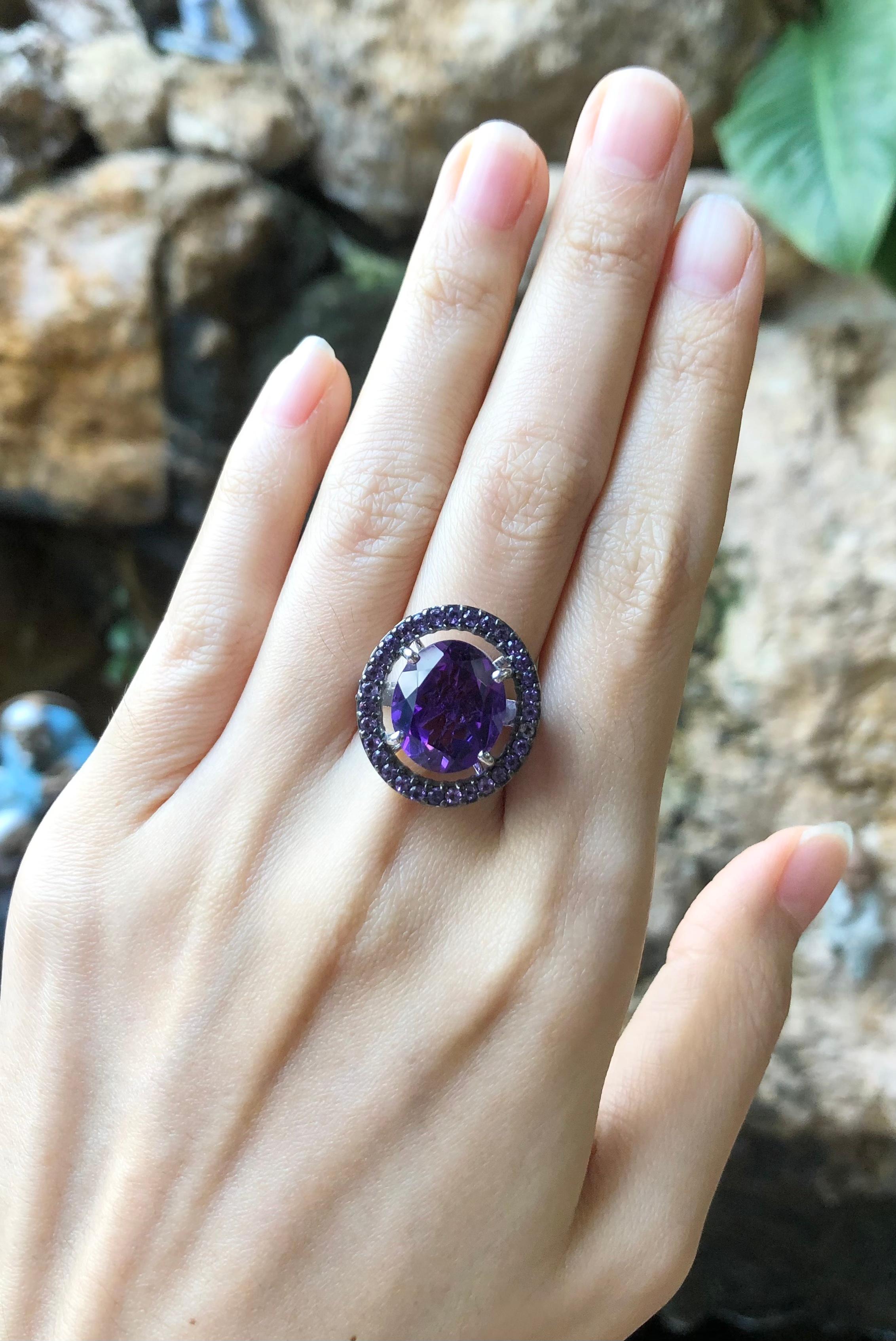 Amethyst 6.60 carats with Amethyst 0.99 carat Ring set in 18 Karat White Gold Settings

Width:  1.9 cm 
Length: 2.1 cm
Ring Size: 54
Total Weight: 9.72 grams

Amethyst
Width:  1.0 cm 
Length: 1.3 cm

