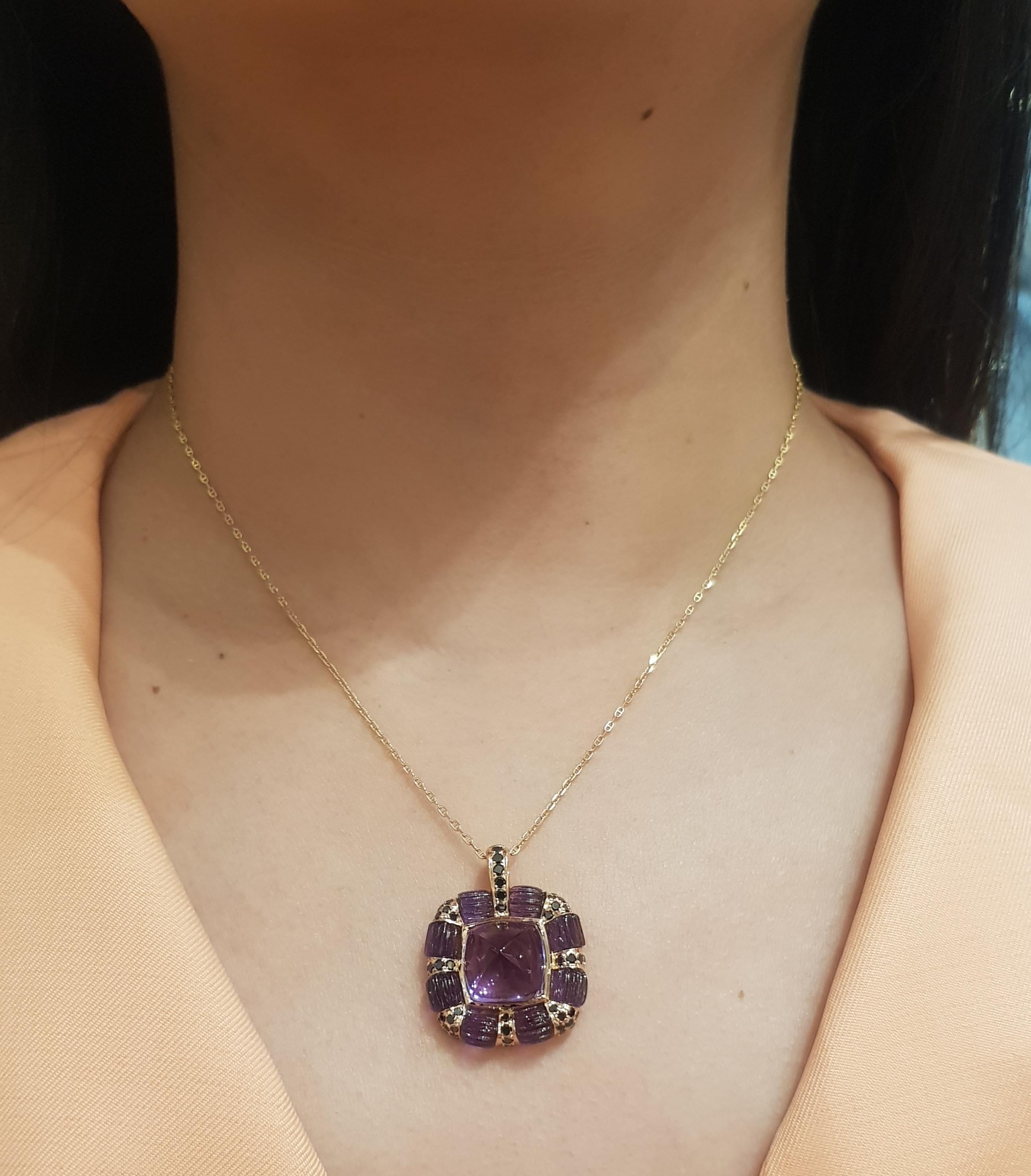 Sugarloaf Amethyst 8.28 carats, Cabochon Amethyst 7.38 carats and Black Diamond 0.78 carat Pendant set in 18K Rose Gold Settings
(chain not included)

Width: 2.2 cm 
Length: 2.9  cm
Total Weight: 9.37 grams

