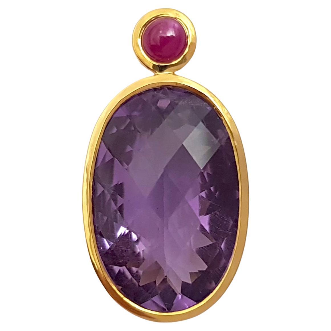 Amethyst with Cabochon Ruby Pendant set in 18K Gold Settings