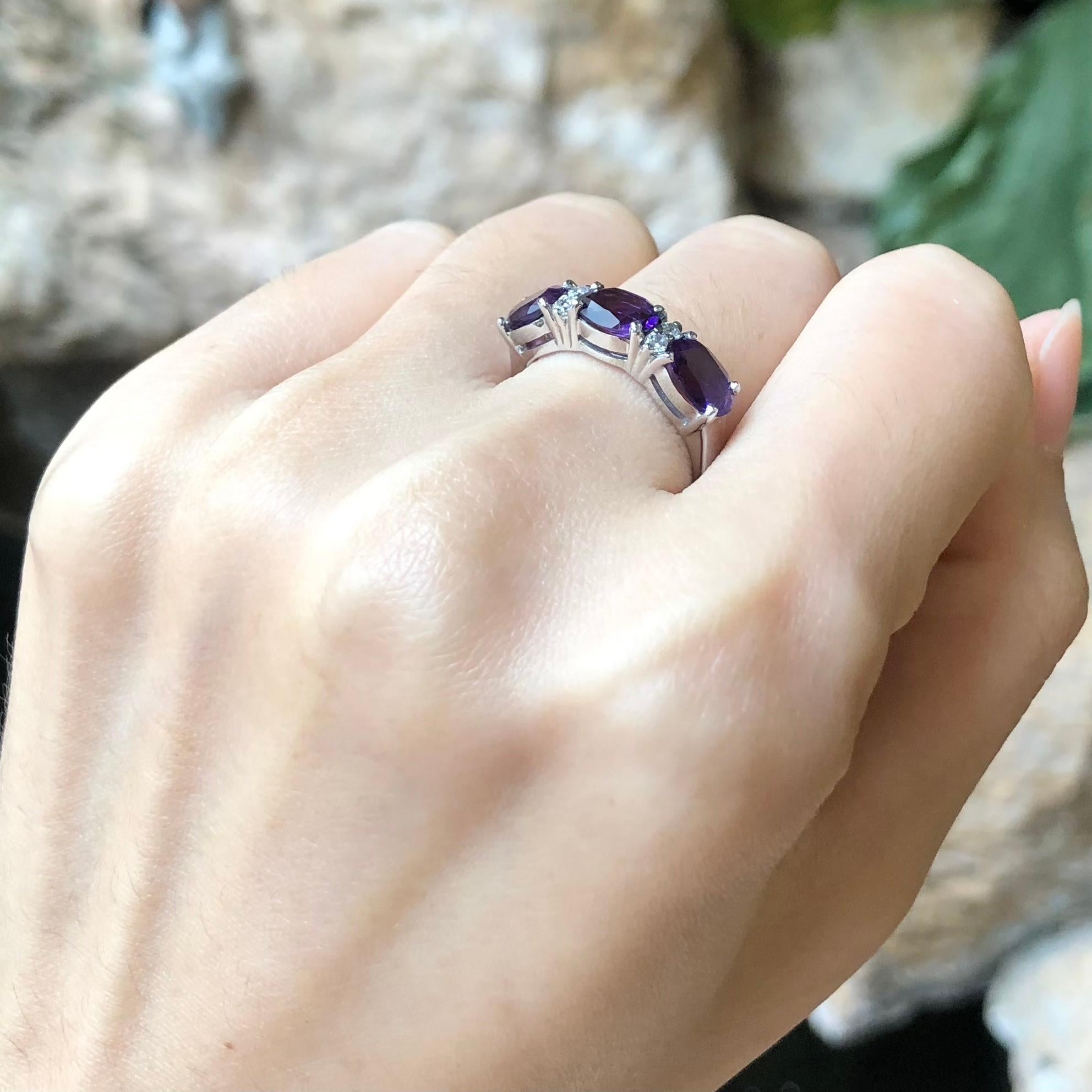Contemporary Amethyst with Cubic Zirconia Ring set in Silver Settings For Sale