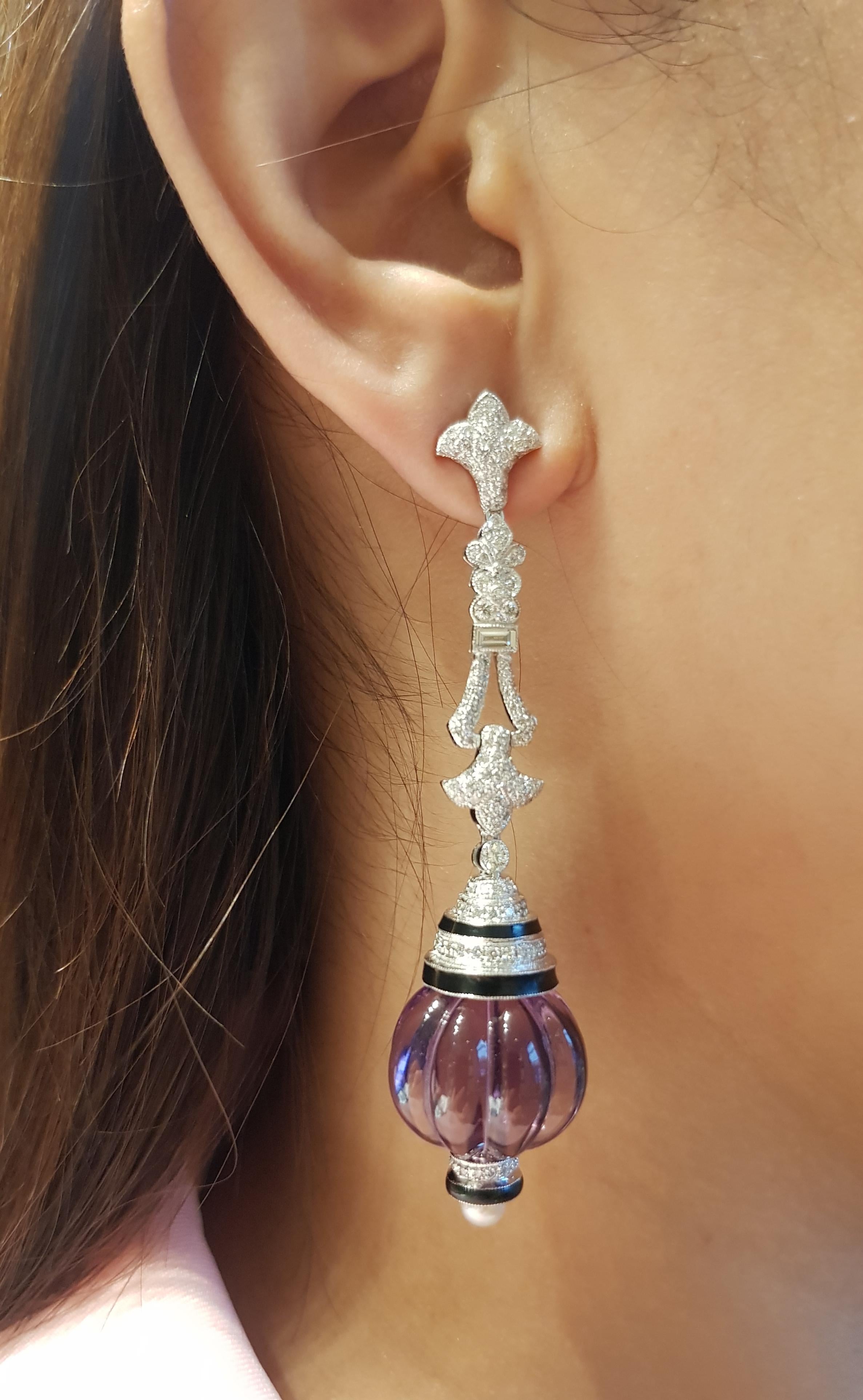 Amethyst 69.95 carats with Diamond 2.11 carats and Pearl Earrings set in 18 Karat White Gold Settings

Width:  1.7 cm 
Length: 7.4 cm
Total Weight: 33.17 grams

