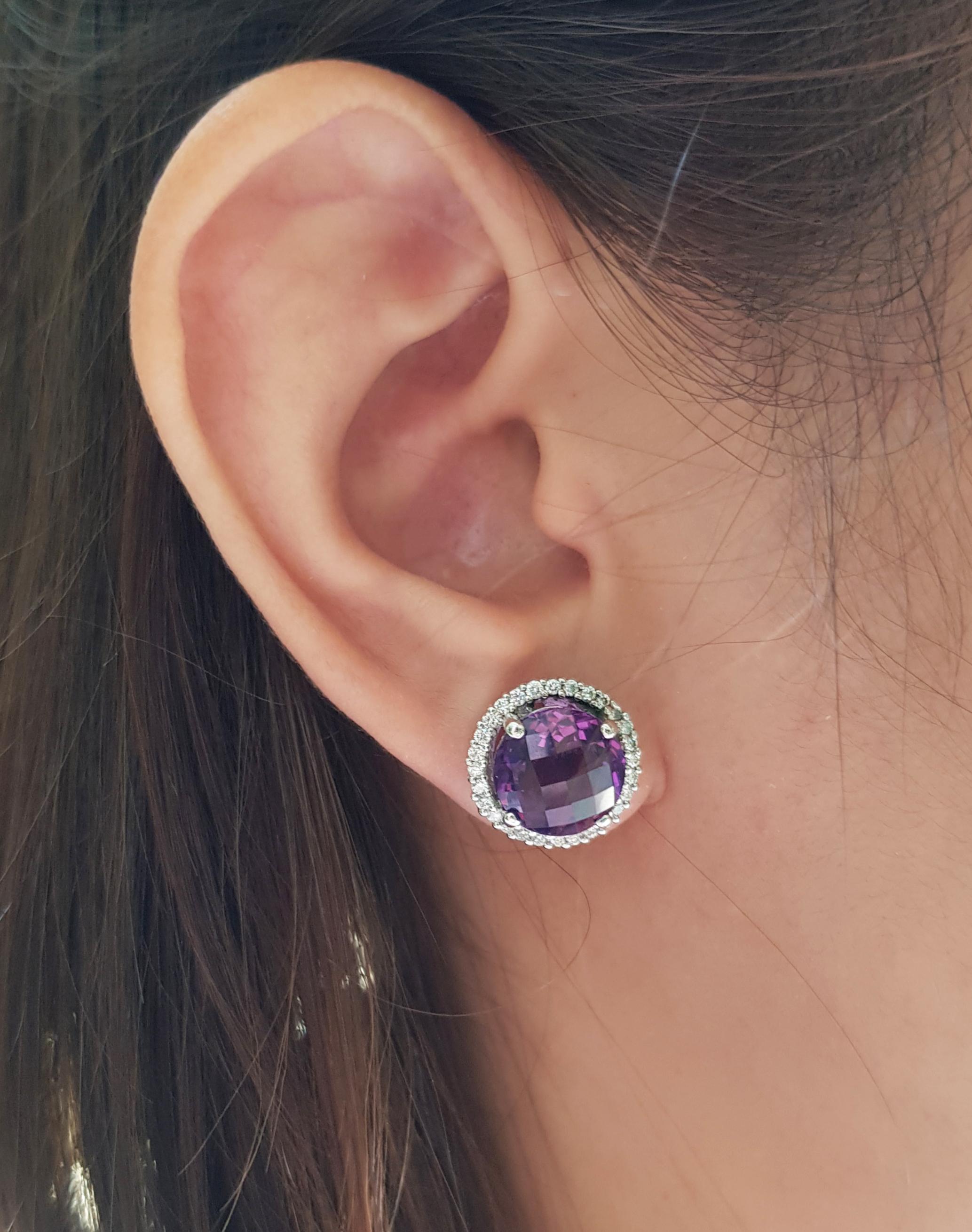 Amethyst 8.06 carats with Diamond 0.52 carat Earrings set in 18 Karat White Gold Settings

Width:  1.4 cm 
Length: 1.4 cm
Total Weight: 8.59 grams

