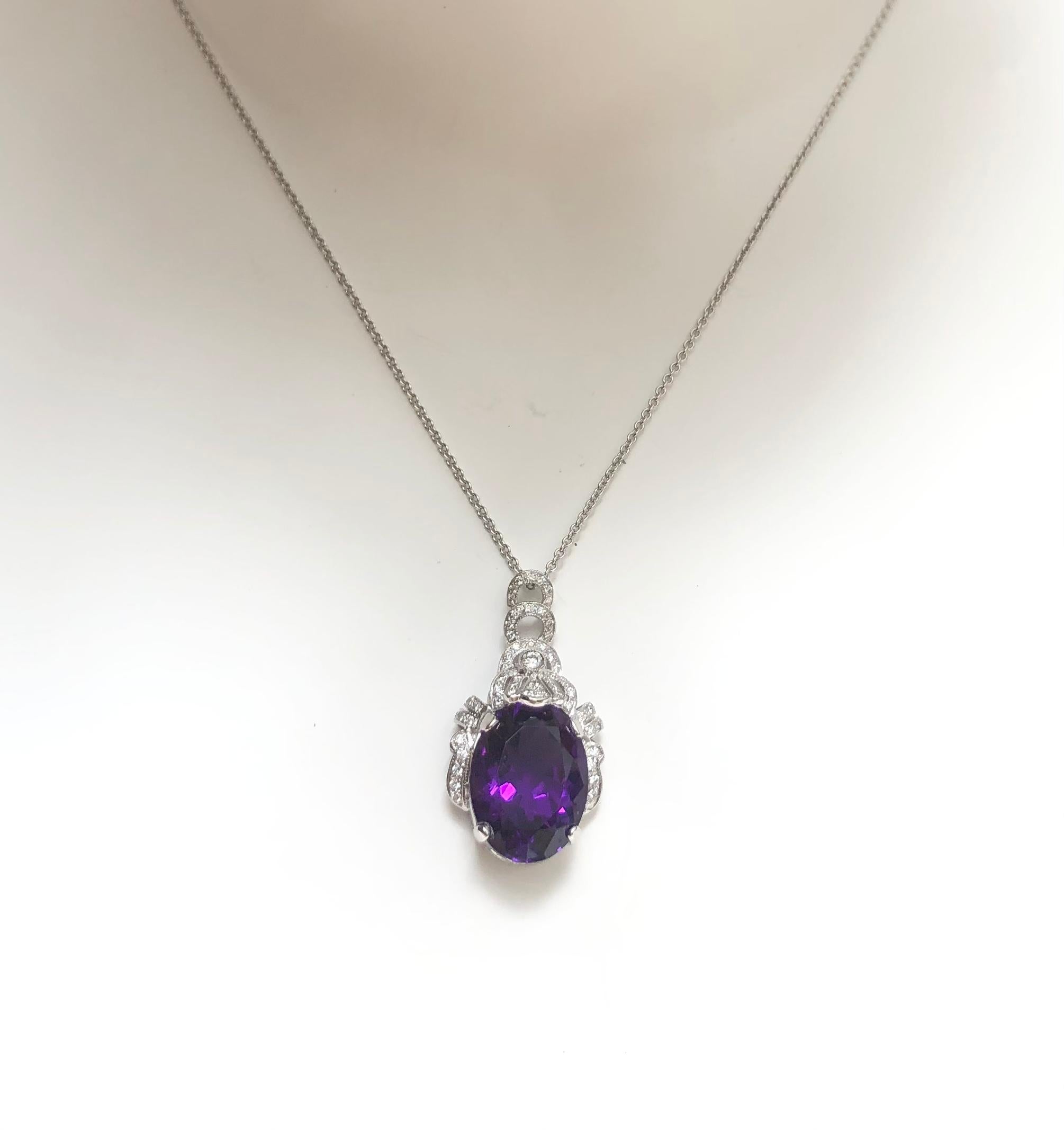 Amethyst 9.41 carats with Diamond 0.26 carat Pendant set in 18 Karat White Gold Settings
(chain not included)

Width:  1.1 cm 
Length: 3.0 cm
Total Weight: 6.35 grams

