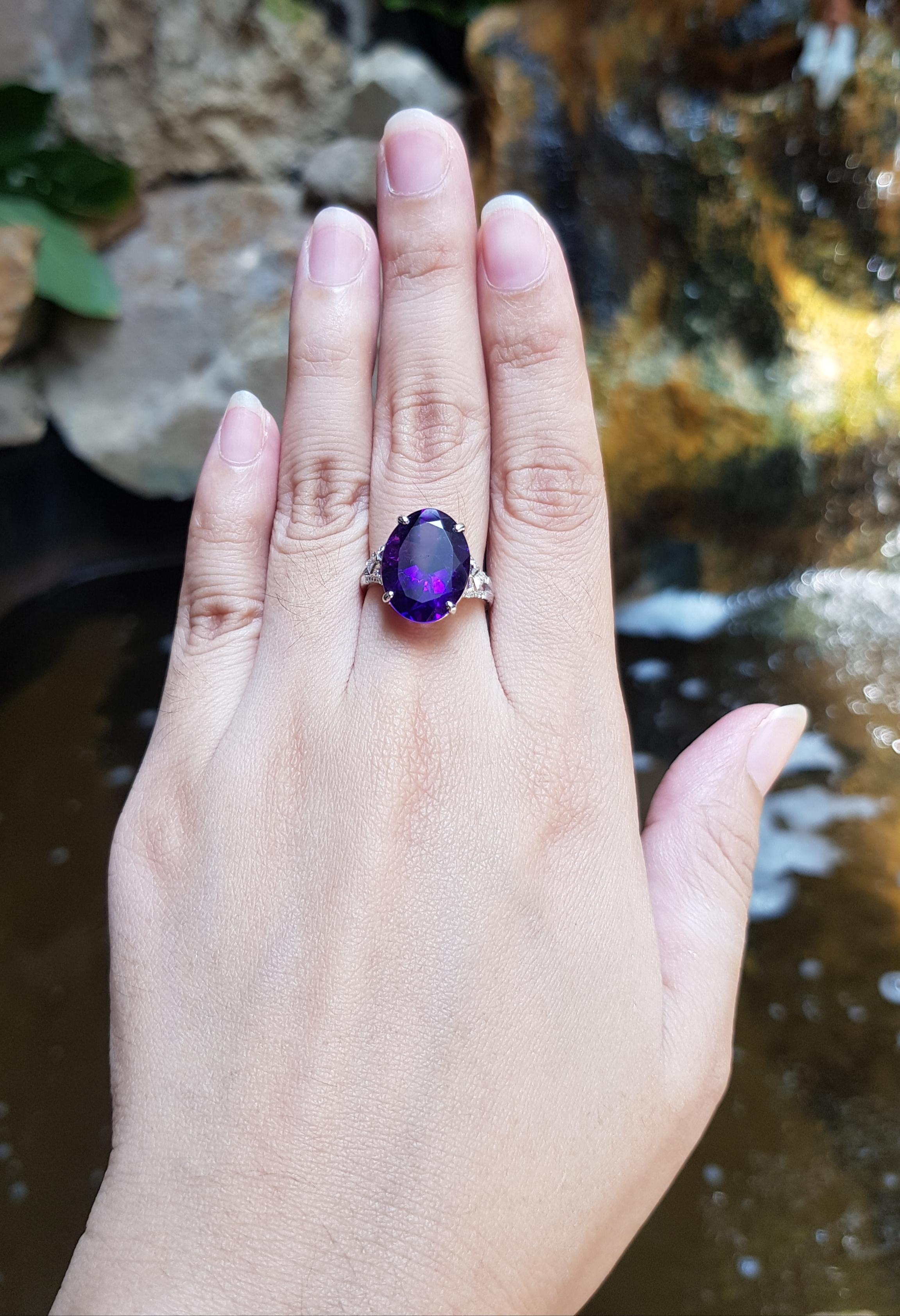Amethyst 7.26 carats with Diamond 0.10 carat Ring set in 18 Karat White Gold Settings

Width:  1.2 cm 
Length: 1.7 cm
Ring Size: 52
Total Weight: 5.15 grams

