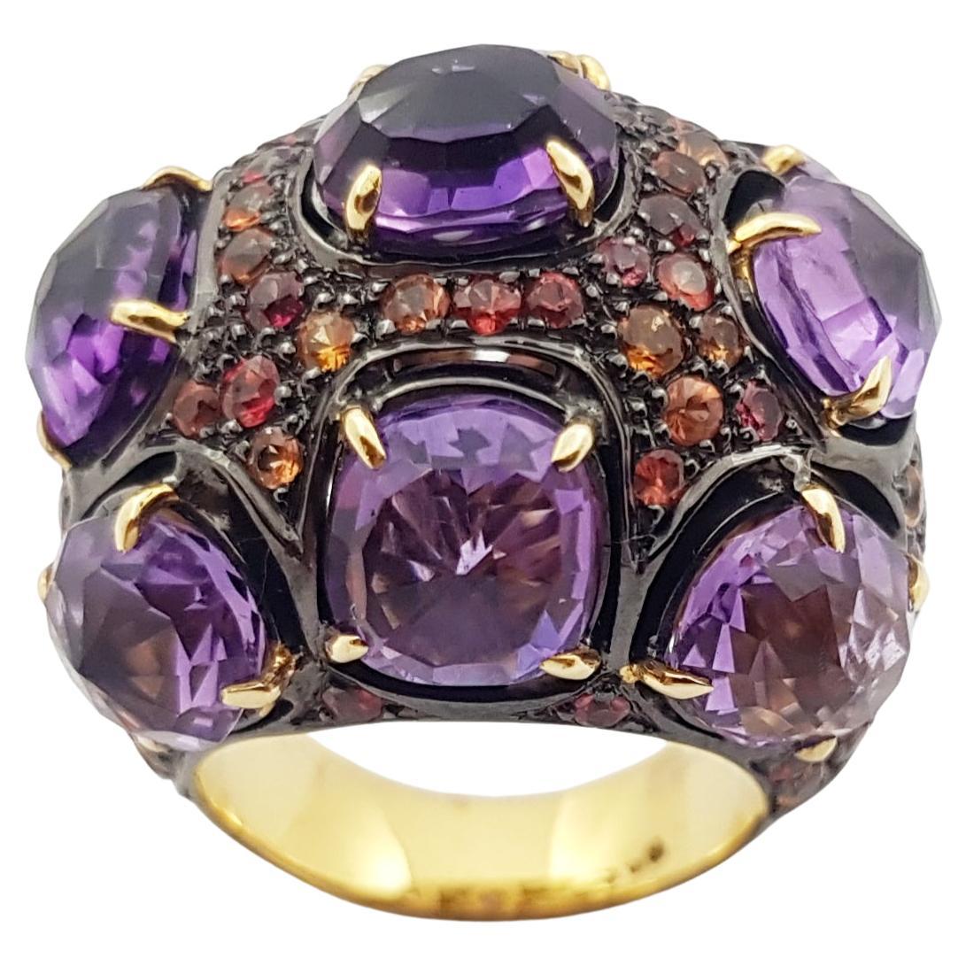 Ring mit Amethyst und orangefarbenem Saphir in Silberfassungen gefasst im Angebot