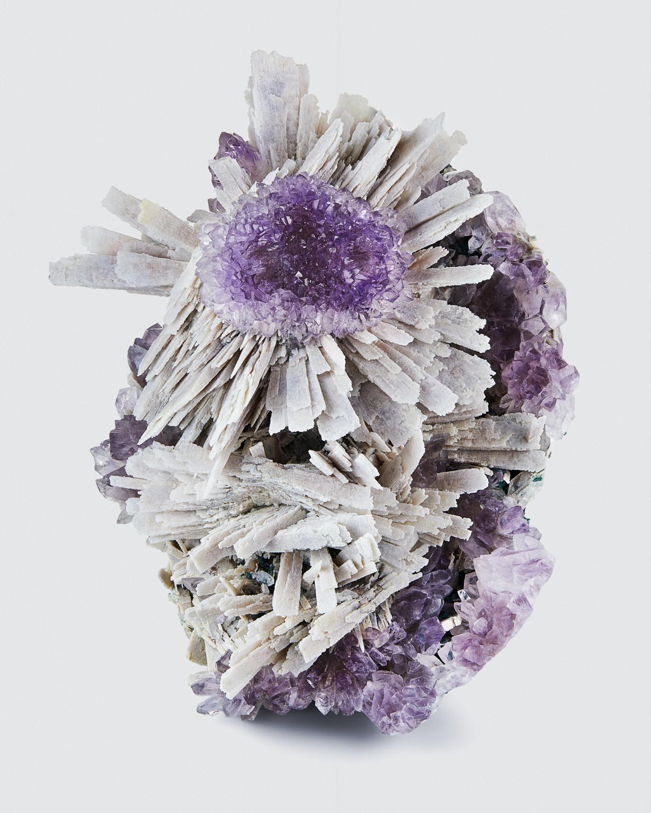 Amethyst with Quartz Pseudomorph Anhydrite, Rio Grande do Sul, Brazil

Superb bright Amethyst surrounded by an explosion of bladed Quartz after Anhydrite crystals.
