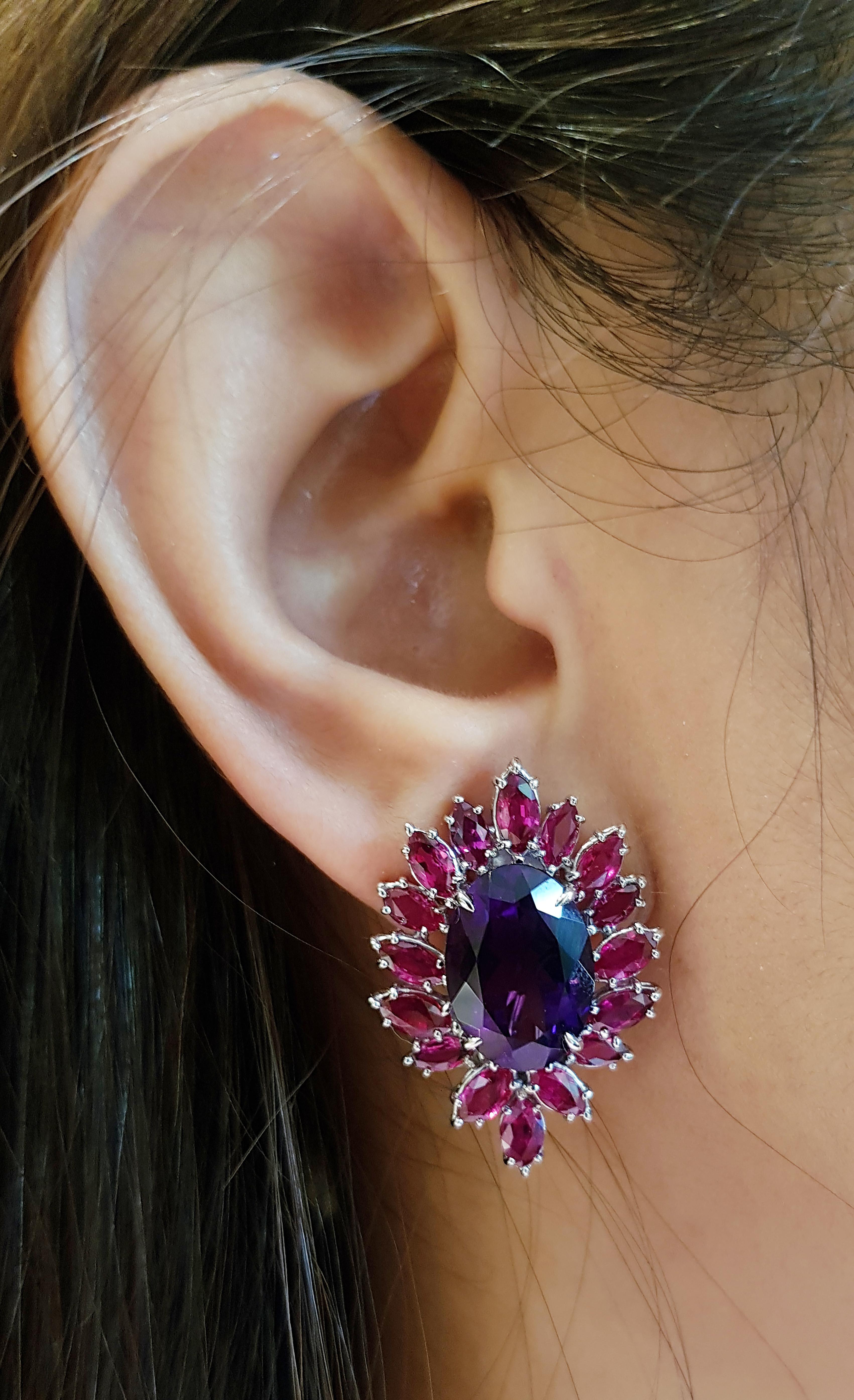 Amethyst 10.65 carats with Ruby 7.22 carats Earrings set in 18 Karat White Gold Settings

Width:  2.0 cm 
Length: 3.0 cm
Total Weight: 13.86 grams

