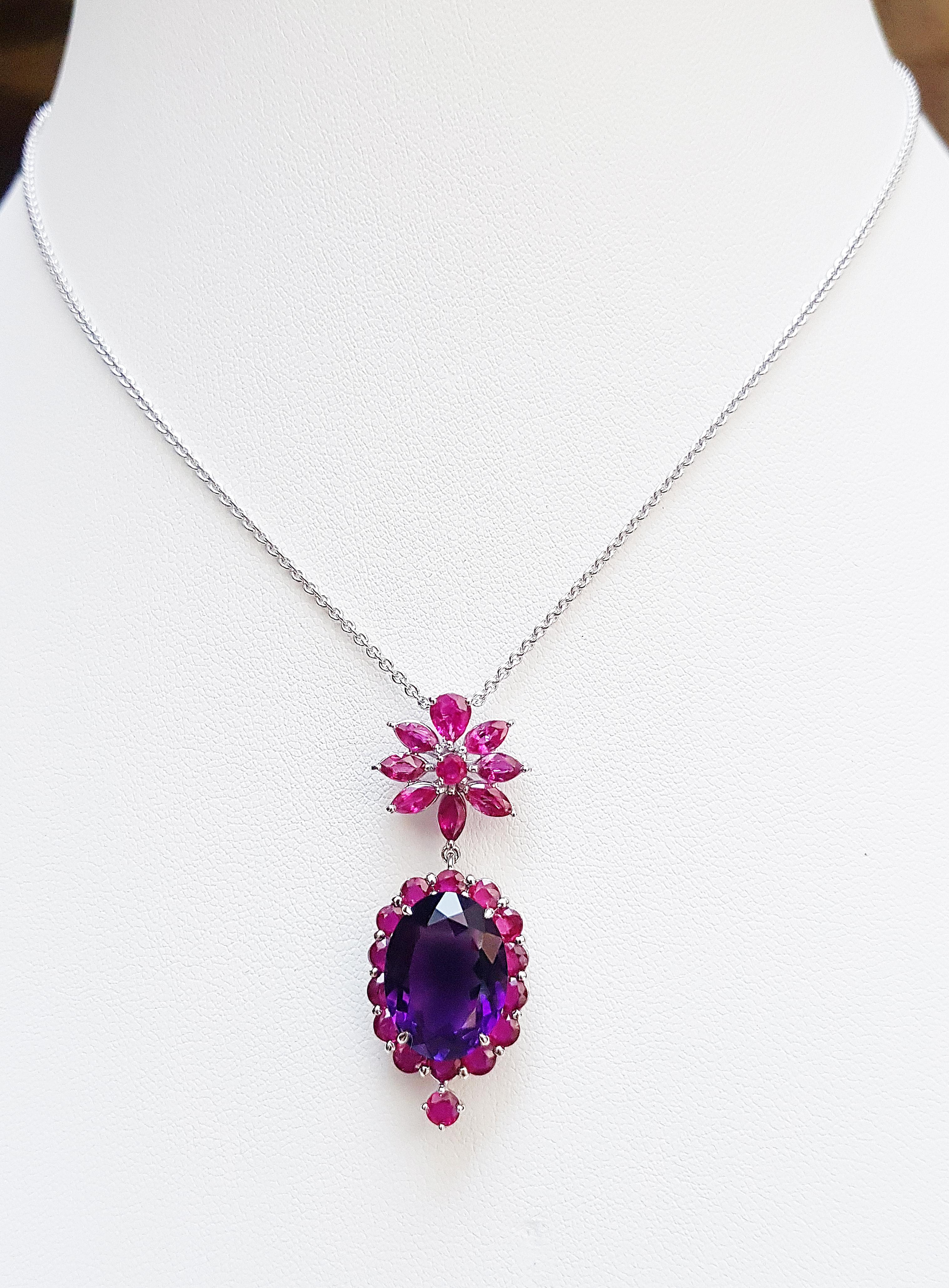 Amethyst 7.87 carats with Ruby 4.98 carats Pendant set in 18 Karat White Gold Settings
(chain not included)

Width:  1.6 cm 
Length: 4.1 cm
Total Weight: 7.71 grams

