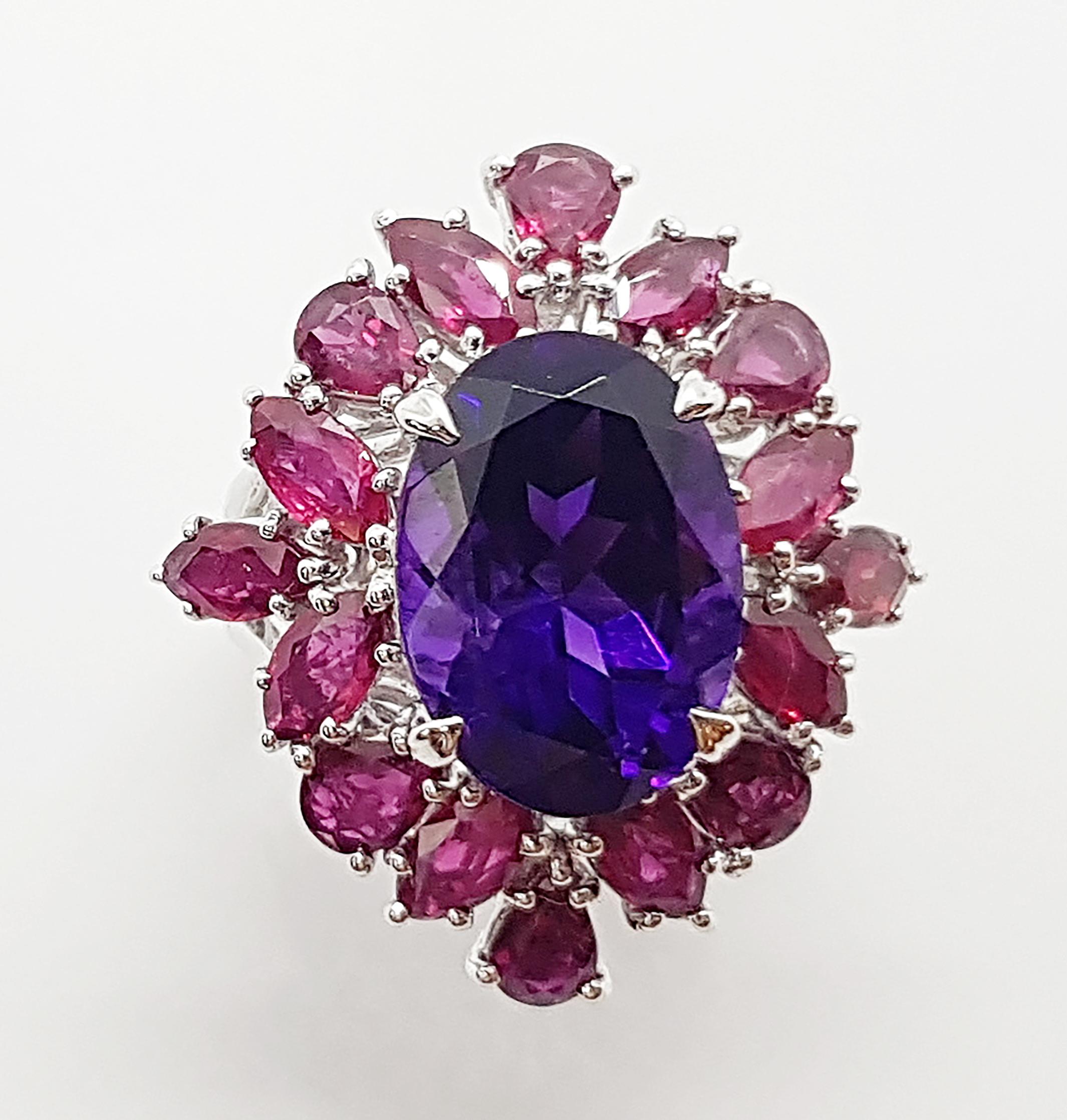 Amethyst 5.70 carats with Ruby 4.12 carats Ring set in 18 Karat White Gold Settings

Width:  2.5 cm 
Length:  2.7 cm
Ring Size: 50
Total Weight: 10.74 grams

* Amethyst*
Width:  1.0 cm 
Length:  1.5 cm



