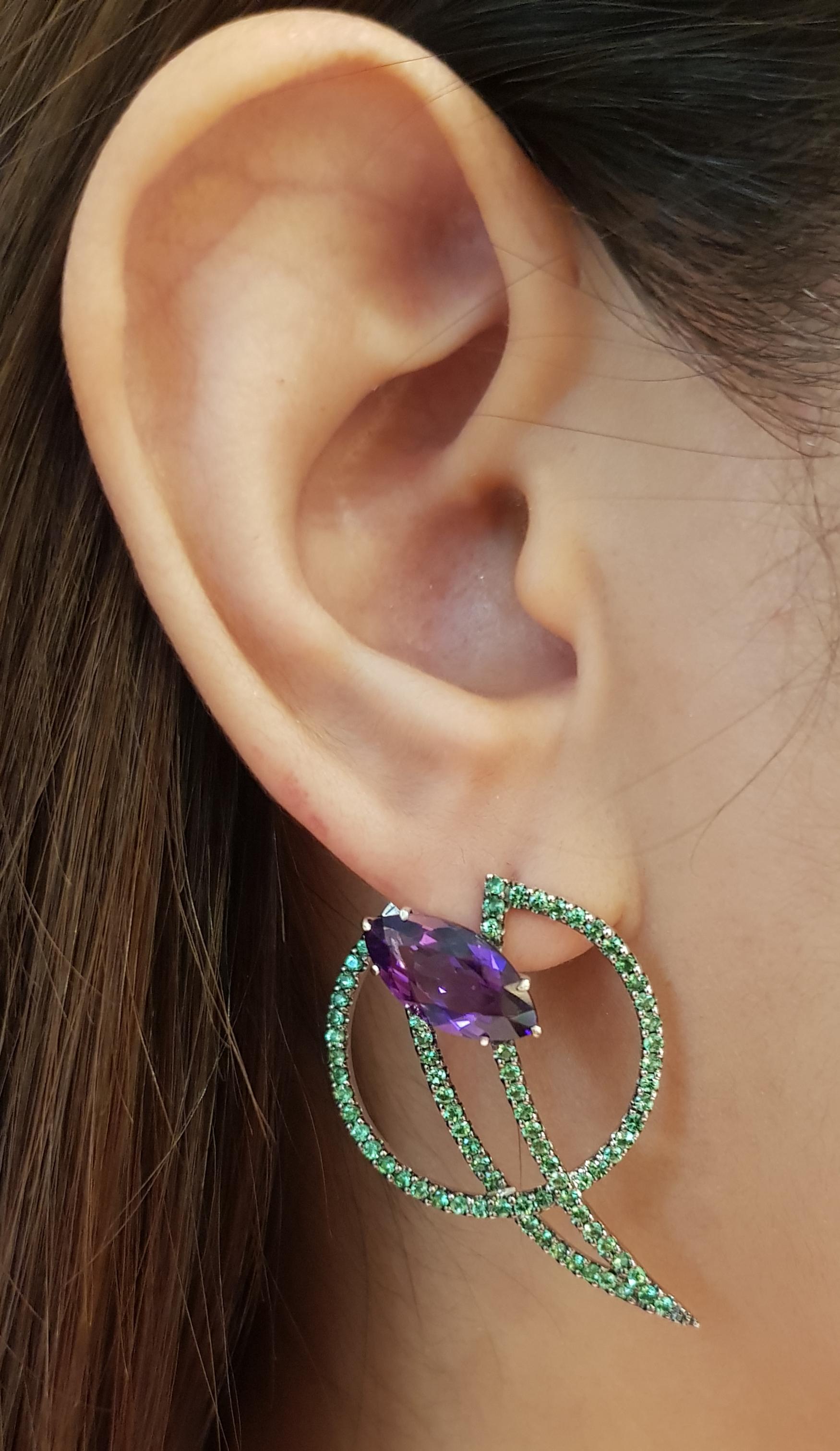 Amethyst 4.76 carats with Tsavorite 1.90 carats Earrings set in 18 Karat White Gold Settings by Kavant & Sharart

Width:  2.5 cm 
Length:  3.9 cm
Total Weight: 11.36 grams

