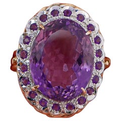 Bague en or rose 14 carats, améthystes et diamants.