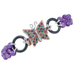 Armband aus Amethysten, Diamanten, Smaragden, Rubinen, Saphiren, Onyx, Gold und Silber