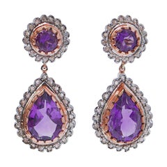 Orecchini con ametiste, diamanti, oro rosa e argento.