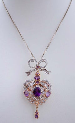 Collier à pendentifs en améthystes, diamants, or rose et argent.