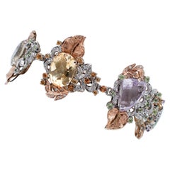Ametiste, topazi, ametista verde, peridoti, bracciale in oro rosa e oro bianco