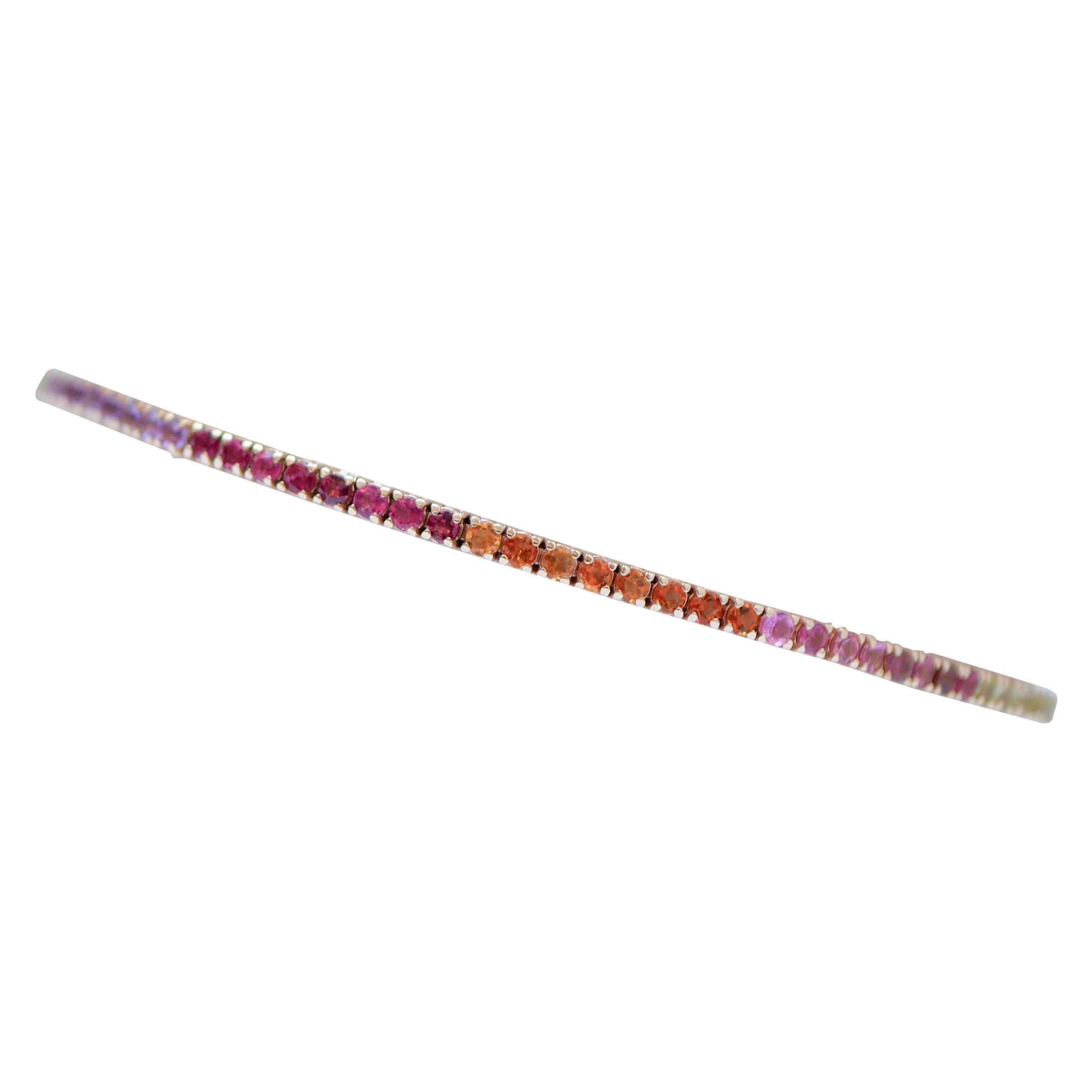 Bracelet tennis en or rose avec améthystes, tourmalines, topaze, péridots