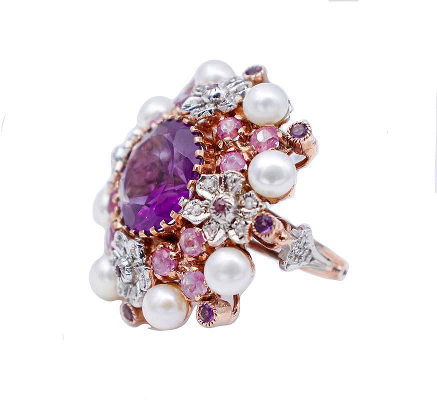 SHIPPING POLICY:
No additional costs will be added to this order.
Shipping costs will be totally covered by the seller (customs duties included). 

Gorgeous retrò ring in 9 karat rose gold and silver structure mounted with a central amethyst ( 14