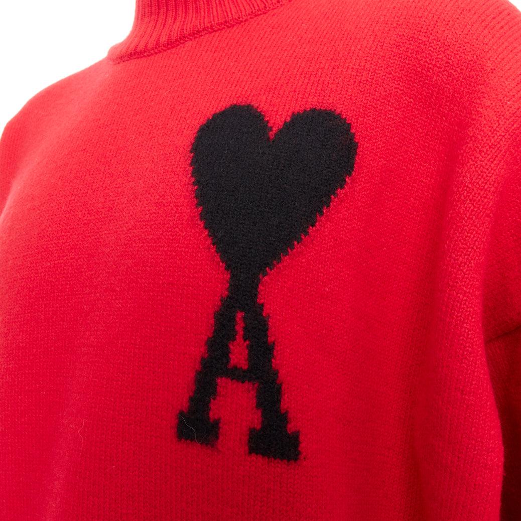 AMI de Coeur red virgin wool black heart logo turtleneck sweater L
Reference: TGAS/E00694
Brand: Ami
Collection: Ami De Coeur
Material: Virgin Wool
Color: Red, Black
Pattern: Solid
Closure: Pullover
Extra Details: A symbol of Ami Paris since 2016,