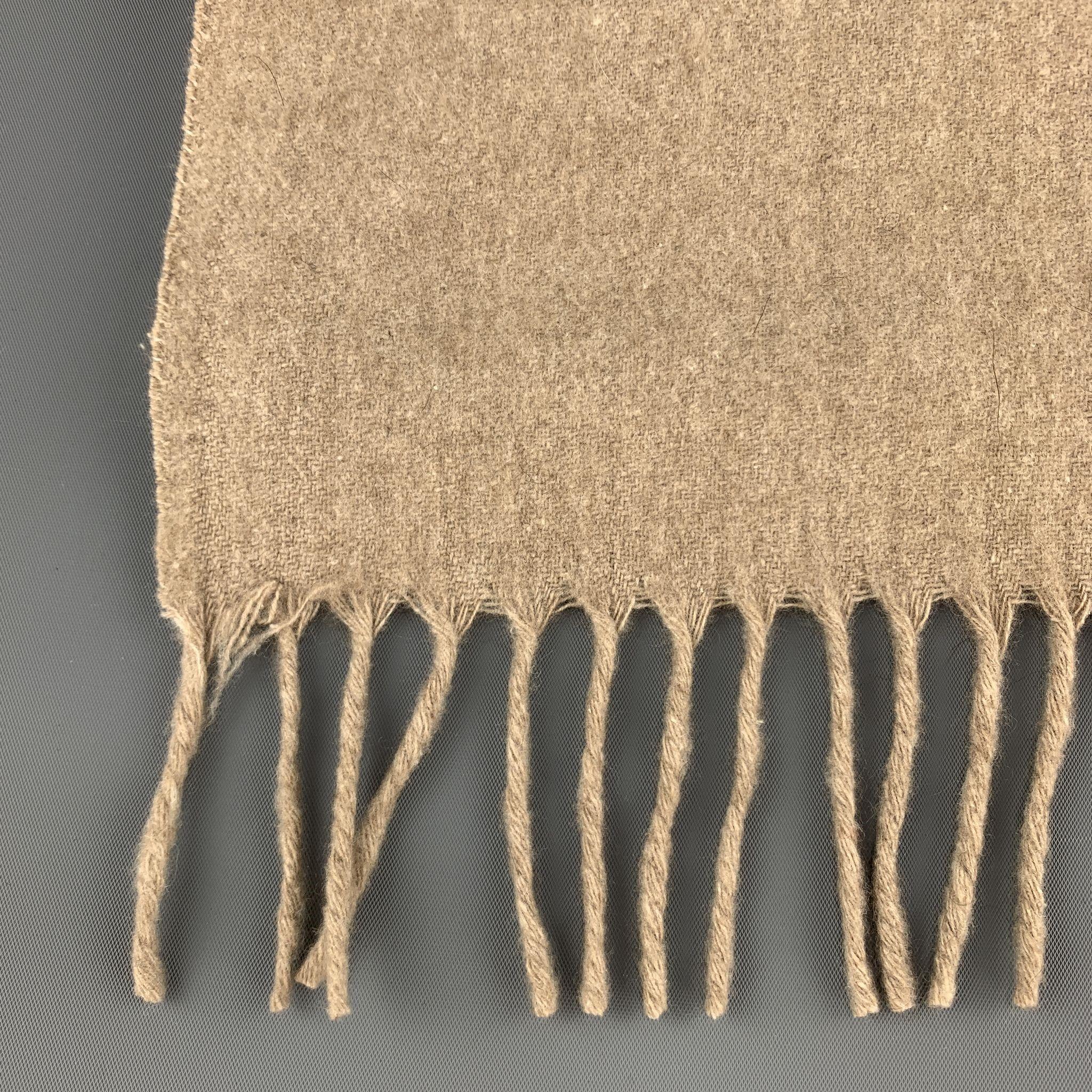 AMICALE winter scarf comes in taupe cashmere with two and a quarter inch fringe trim. 

Very Good Pre-Owned Condition.

28 x 13 in.