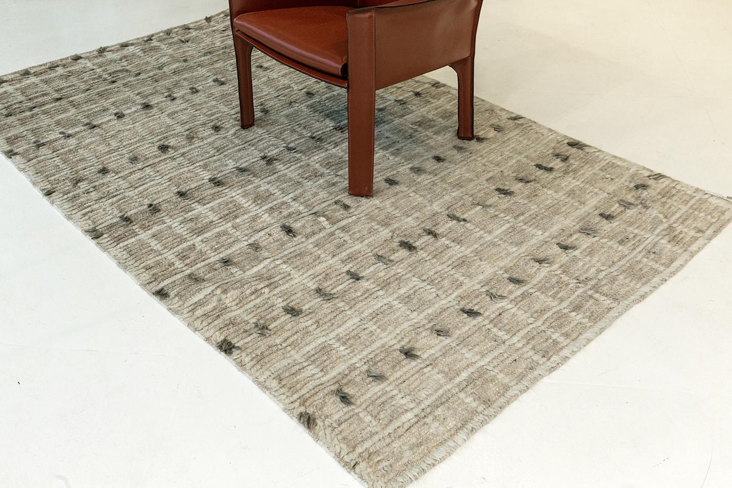 Amihan is a beautifully detailed pile weave from our Atlas Collection. The delicate checkered and ribbed style rug with earthy charcoal tones give it a rich and charming feel. Repeating black pile detailing also brings a bold and noteworthy