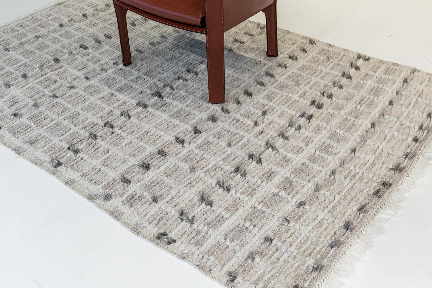 Amihan is a beautifully detailed pile weave from our Atlas Collection. The delicate checkered and ribbed style rug with ash gray tones give it a rich and charming feel. Repeating ash pile detailing also brings a bold and noteworthy uniqueness to