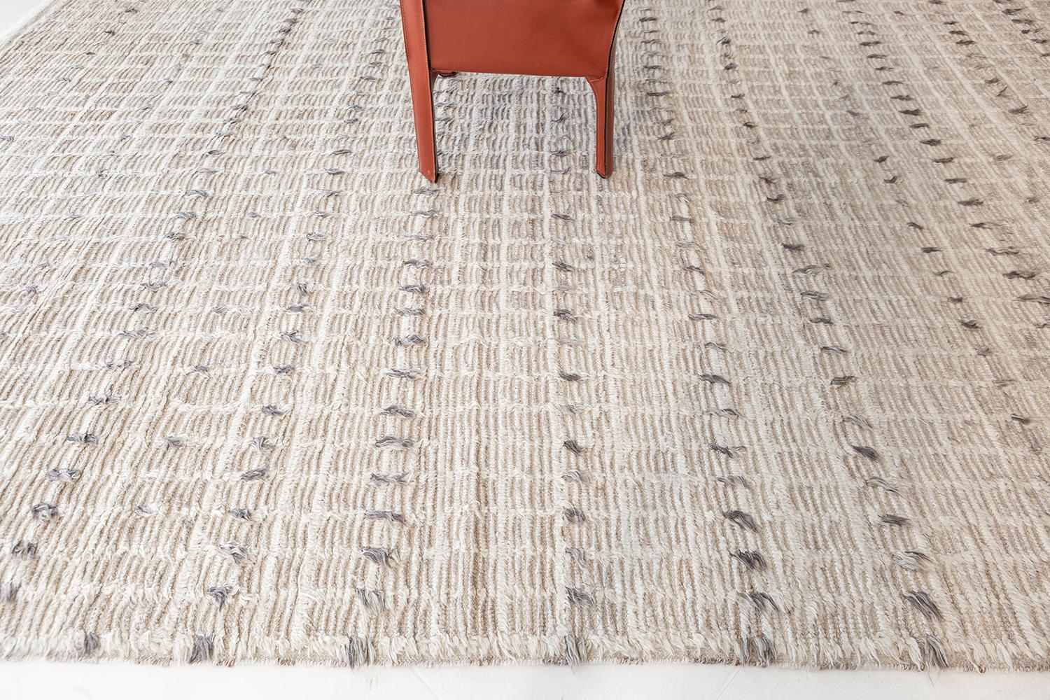 Amihan is a beautifully detailed pile weave from our Atlas Collection. The delicate checkered and ribbed style rug with hint of earthy charcoal tones give it a rich and charming feel. Repeating gray pile detailing also bring a bold and noteworthy