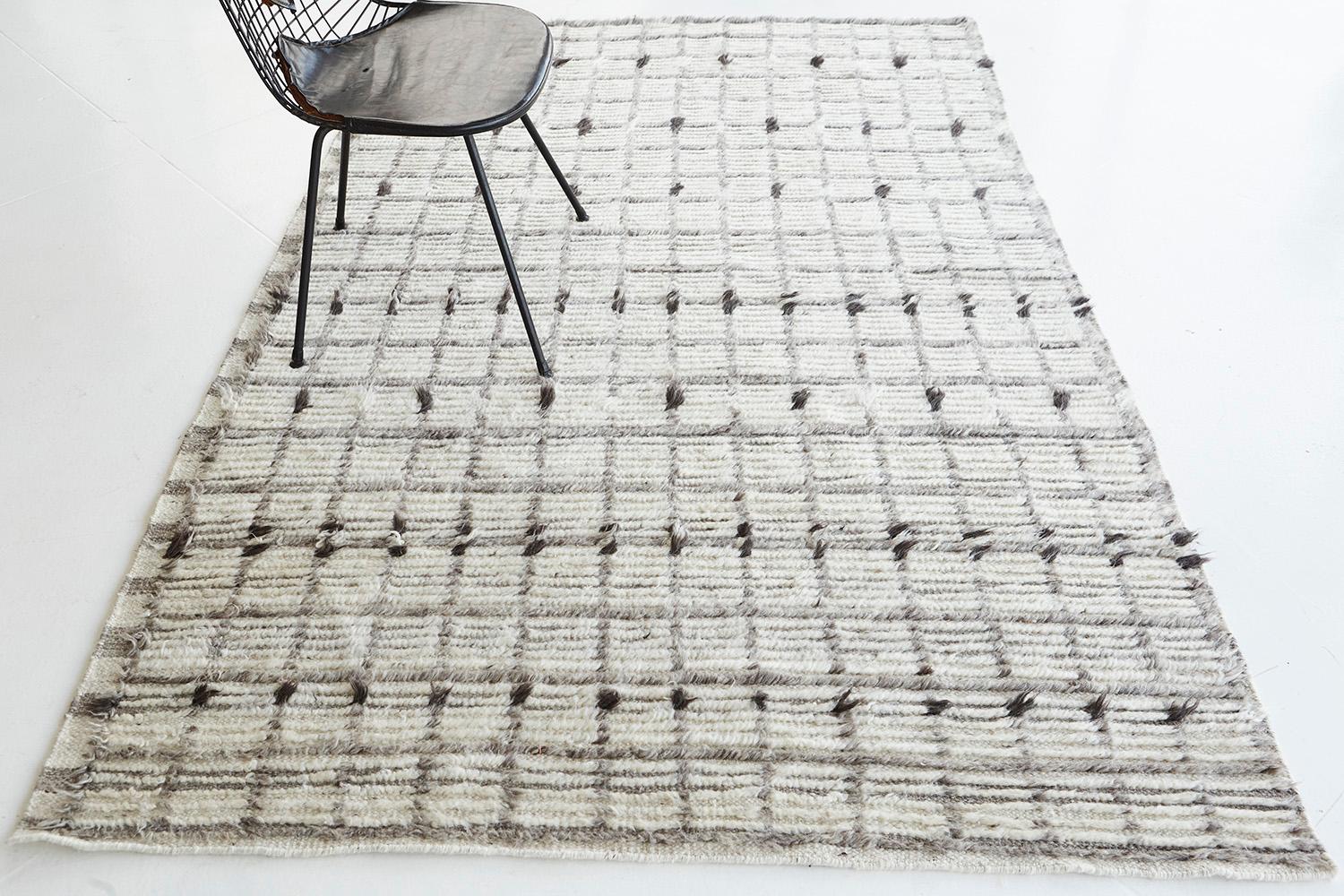 Amihan is a beautifully detailed pile weave from our Atlas Collection. The delicate checkered and ribbed style rug with grayscale tones gives a rich and charming feel. Repeating ash pile detailing also brings a bold and noteworthy uniqueness to this