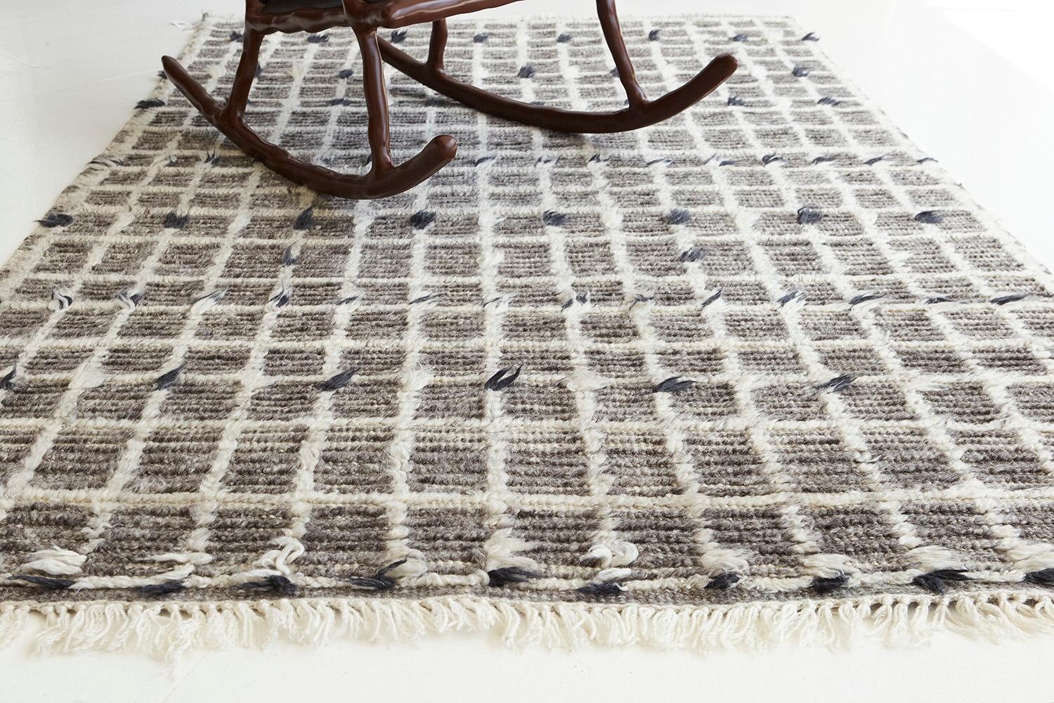 Amihan is a beautifully detailed pile weave from our Atlas Collection. The delicate checkered and ribbed style rug with charcoal and ash tones gives a rich and charming feel. Repeating ash pile detailing also brings a bold and noteworthy uniqueness