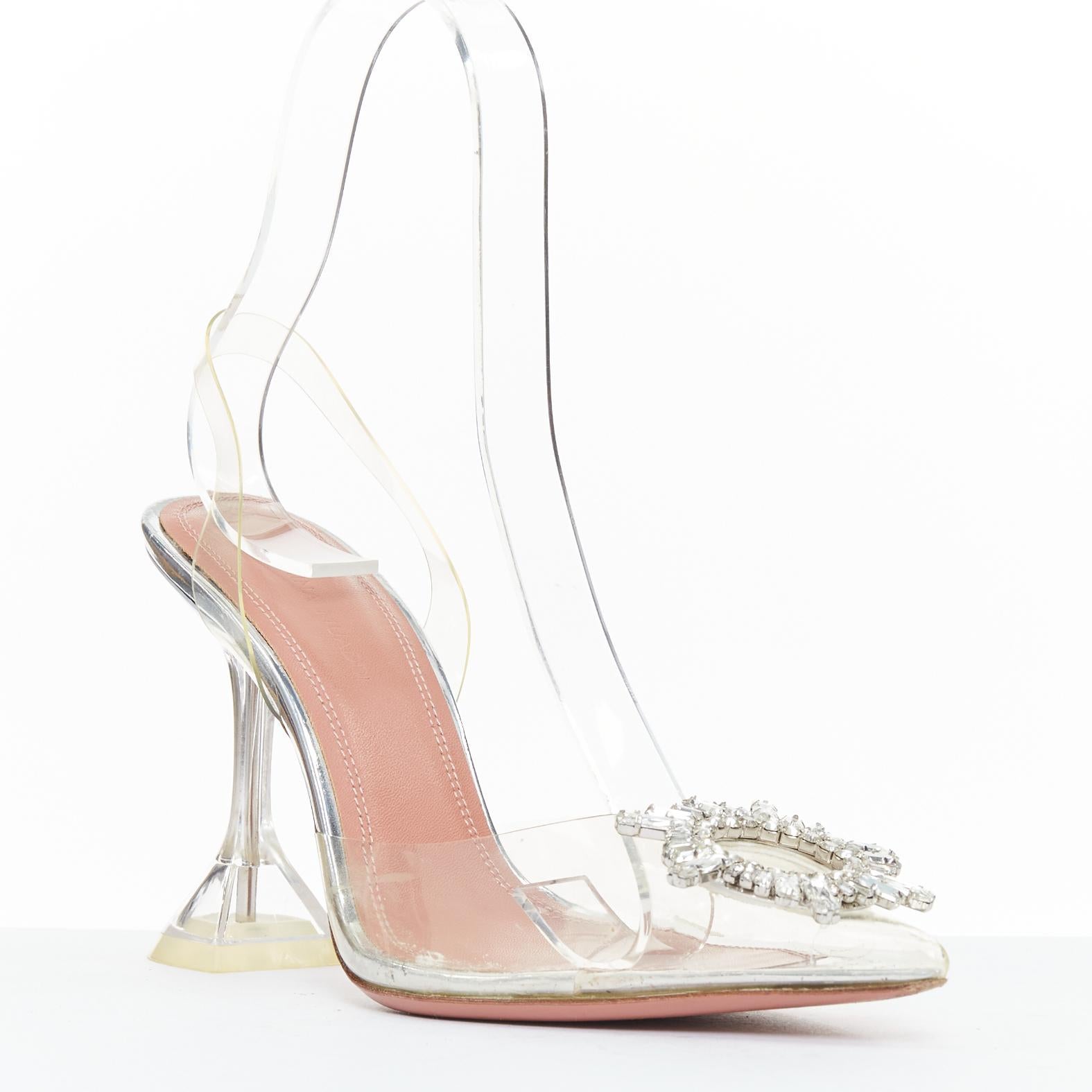 AMINA MUADDI BEgum 95mm Glass PVC crystal buckle sling transparent pump EU36
Reference: TGAS/F00027
Brand: Amina Muaddi
Pattern: Solid

SIZING
Designer size: EU36
Size reference: EU36 / US6 / UK3 / JP23.5

We are not affiliated with Amina Muaddi.