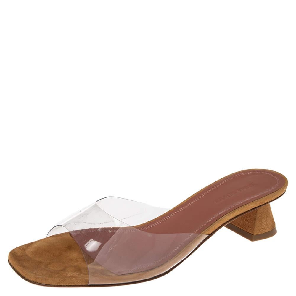 Be all smiles when you step out in these sandals from Amina Muaddi as they are comfortable and gorgeous. With a PVC strap at the front, they feature a minimalist appeal and brown suede and leather insoles. The pair is complete with sculptural low
