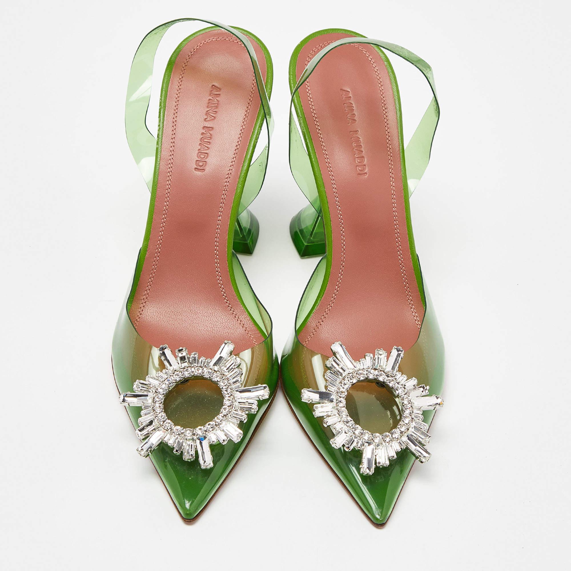 Carved perfectly into a feminine silhouette, this pair of mules from Amina Muaddi accurately denote the label's skilled craftsmanship and style. It is made from PVC in an elegant green shade. These shoes are finished off with a slingback and