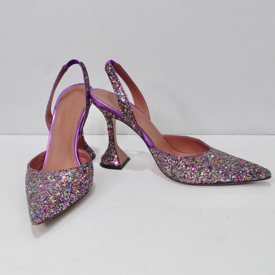 These Amina Muaddi glitter pumps are the perfect way to spice up any outfit! Stunning multicolor glittery slingback pumps in one of Amina Muaddis most coveted silhouettes! The pointed toe and flared heel is so chic and feminine you are never going